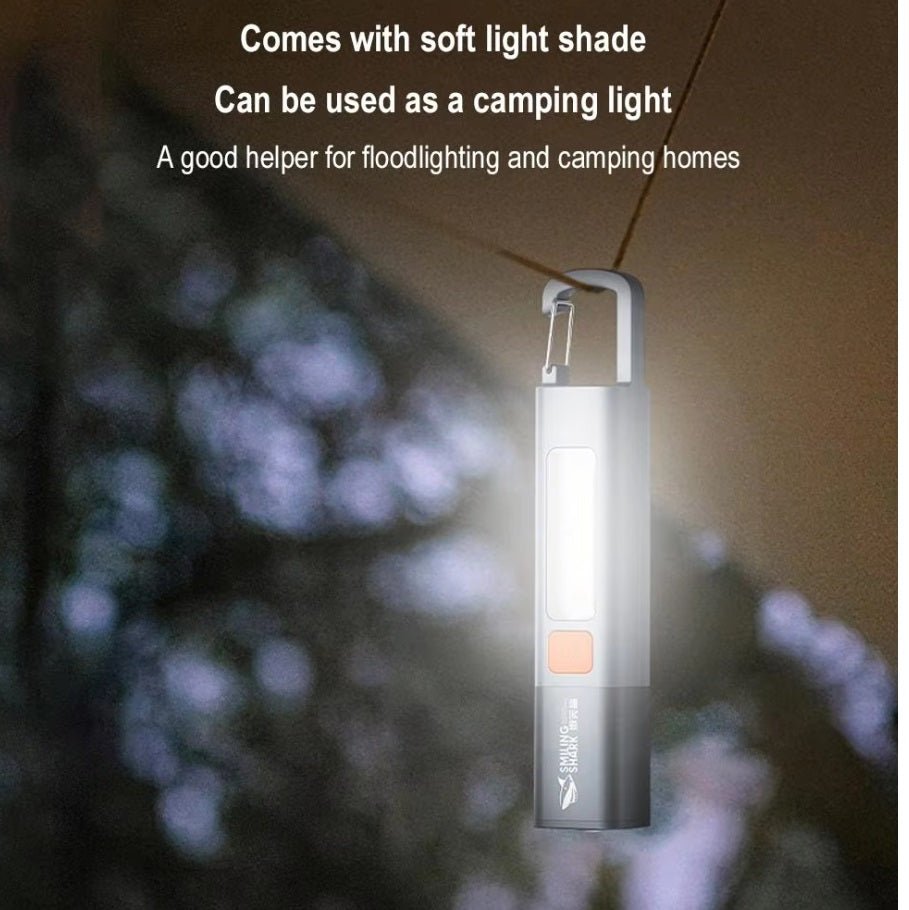 SD1023 Mini LED Flashlight with hook, ideal for camping, providing floodlighting and soft light shade.