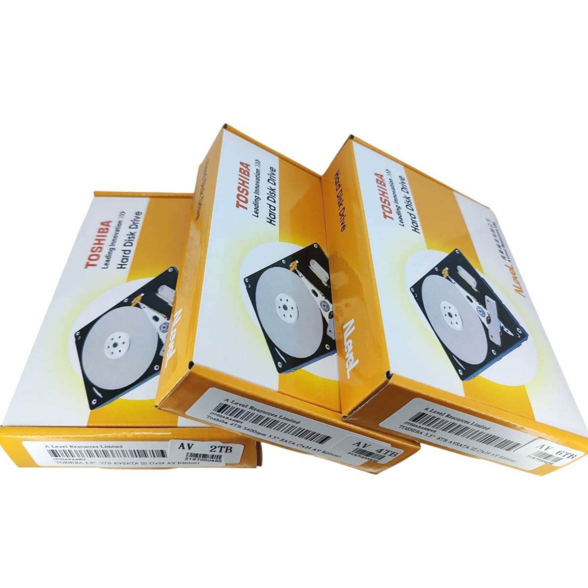 Three Toshiba DT02-V Series Surveillance Hard Drive boxes stacked, showcasing reliable security storage solutions.