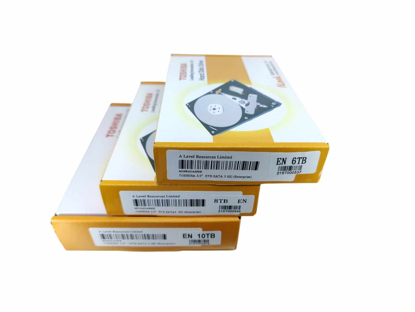 Toshiba enterprise hard drives in packaging, showcasing 6TB, 8TB, and 10TB options for data storage solutions.