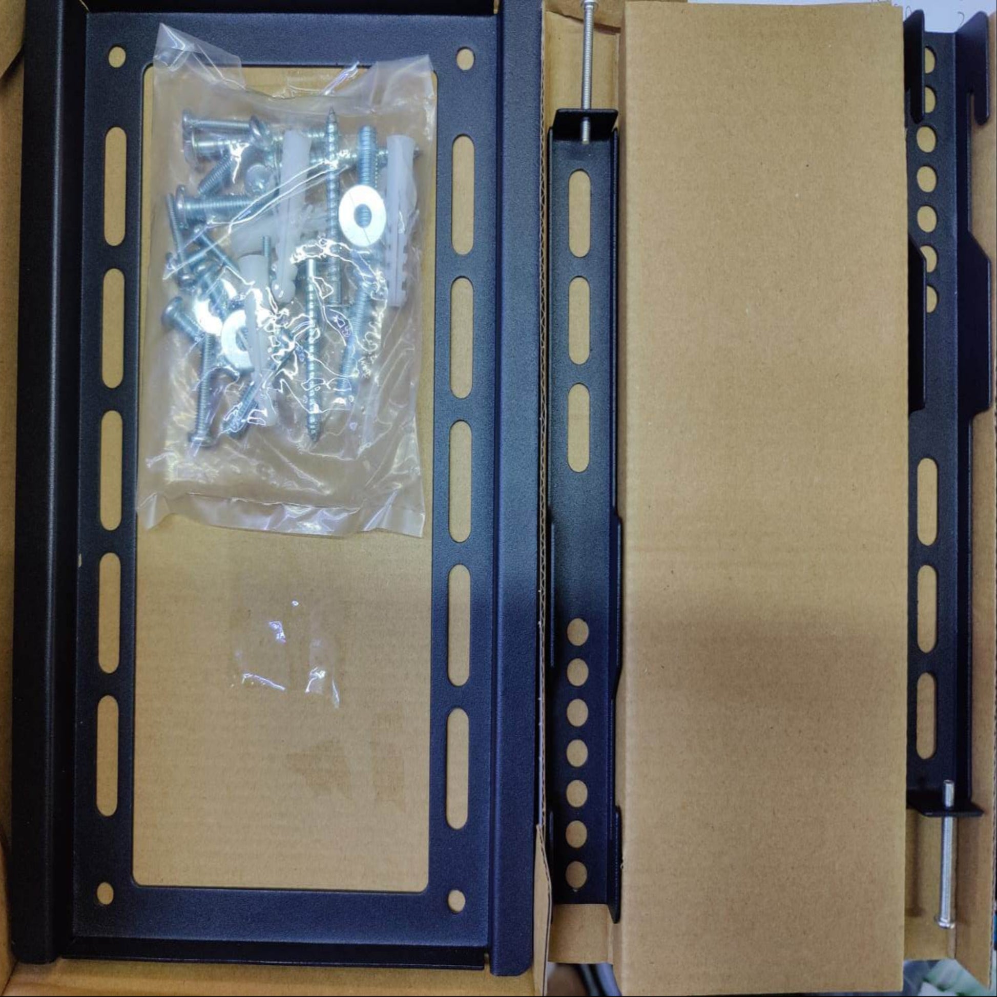 Tiger Mounts SY-F210 TV wall mount with screws and hardware in packaging, suitable for 14-42 inch TVs.