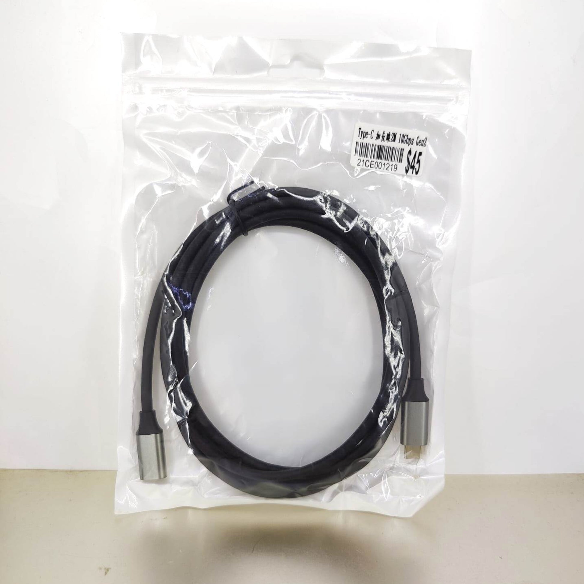 Black 2M USB-C extension cord, 10Gbps Gen2, ideal for charging and data syncing. High-speed, durable.