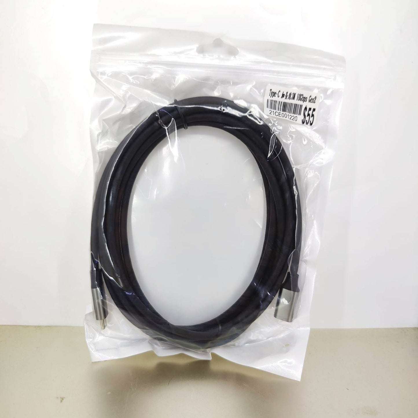 Black 3M USB-C extension cable, 10Gbps Gen2, for fast data transfer and charging. Durable braided design.