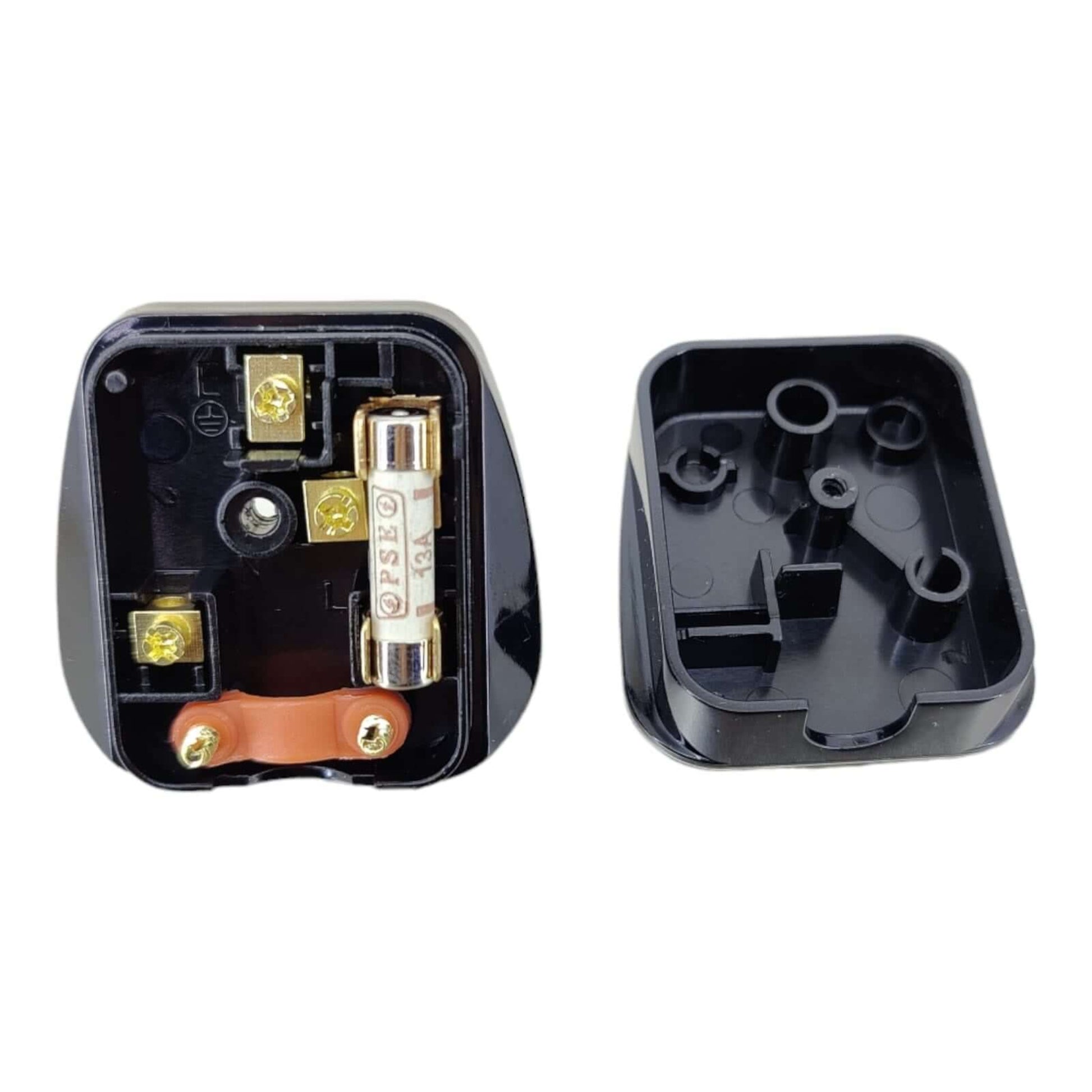 Inside view of an Eight UK BS 1363 rewirable 3-pin power plug showing terminals and fuse.