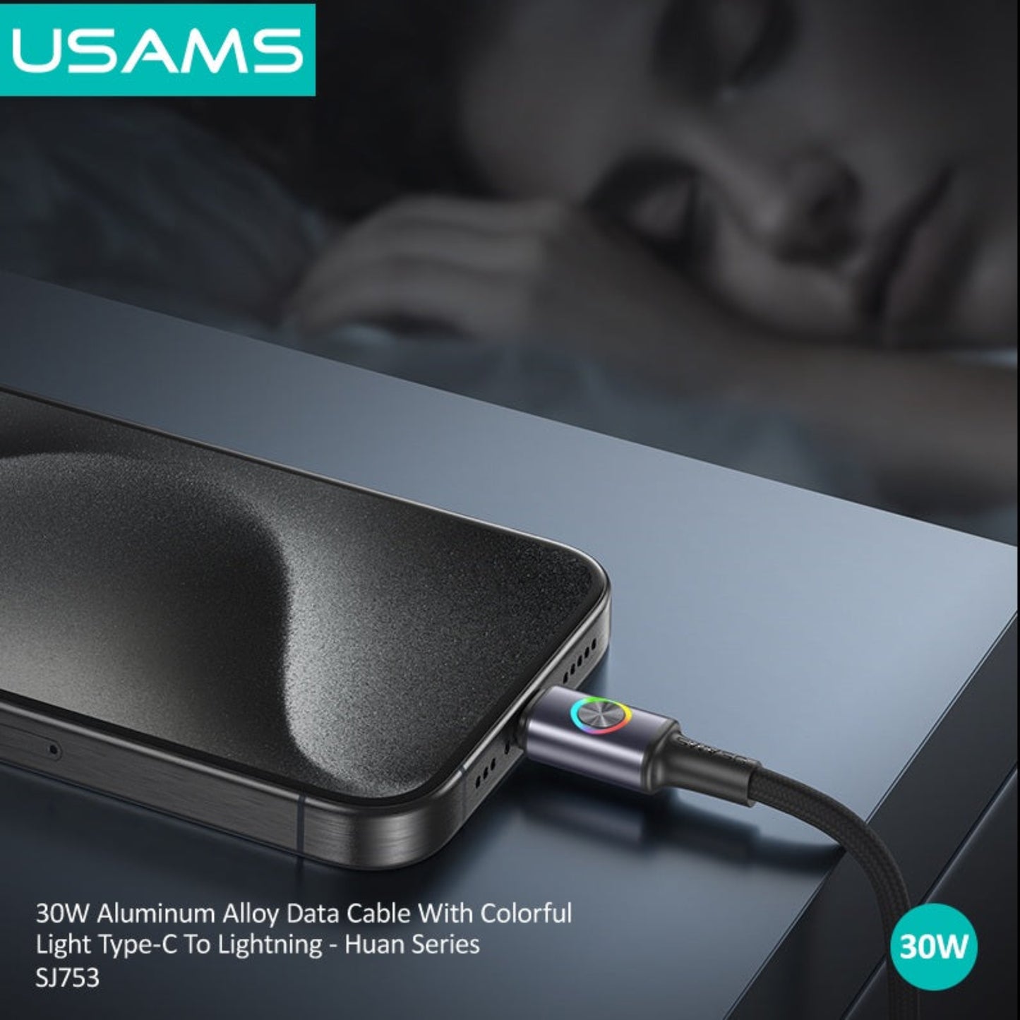 USAMS SJ753 30W cable with a colourful light ring, plugged into an iPhone on a bedside table.