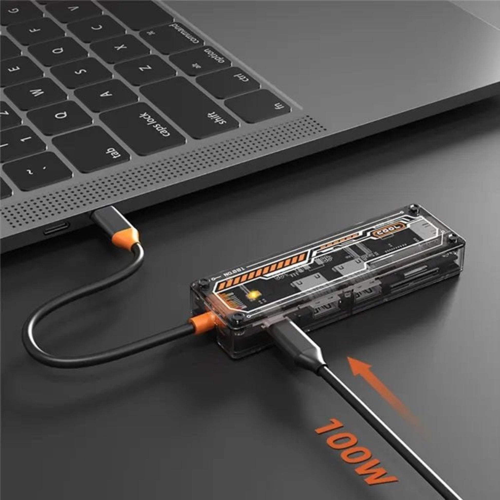 USB-C multiport adapter plugged into a laptop, showcasing 100W fast charging and multiple data transfer options.