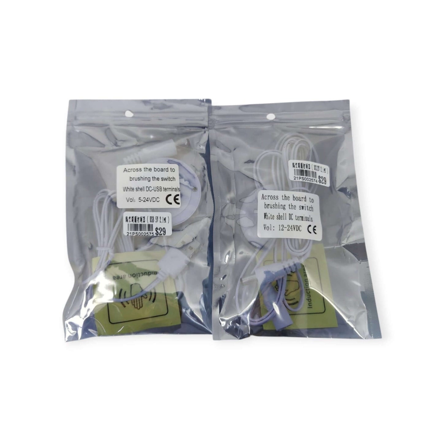 Two wave sensor switches in their retail packaging, showing product details for both the DC and USB versions.