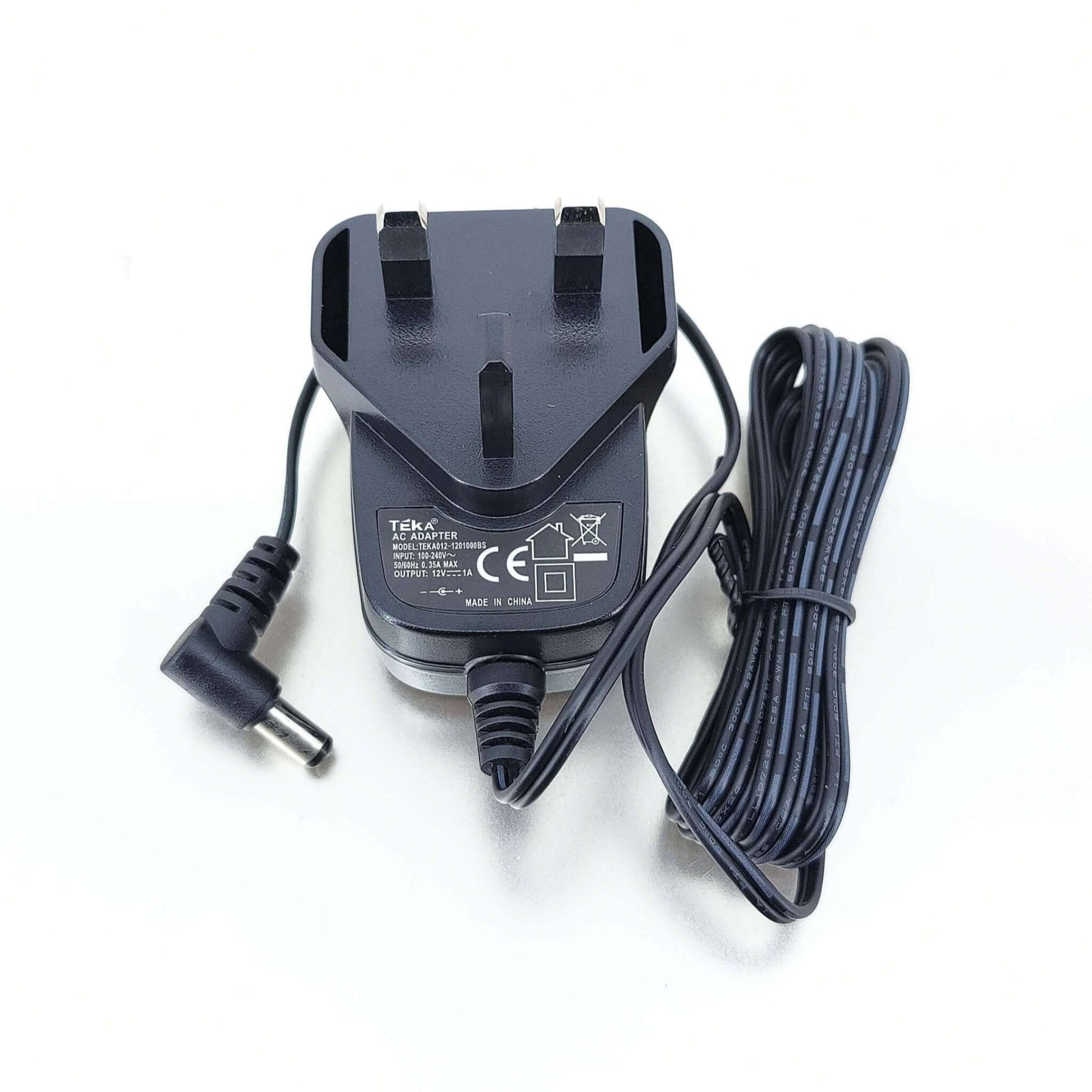 12V 1A DC power adapter with UK plug and 5.5x2.1mm output for electronic devices.