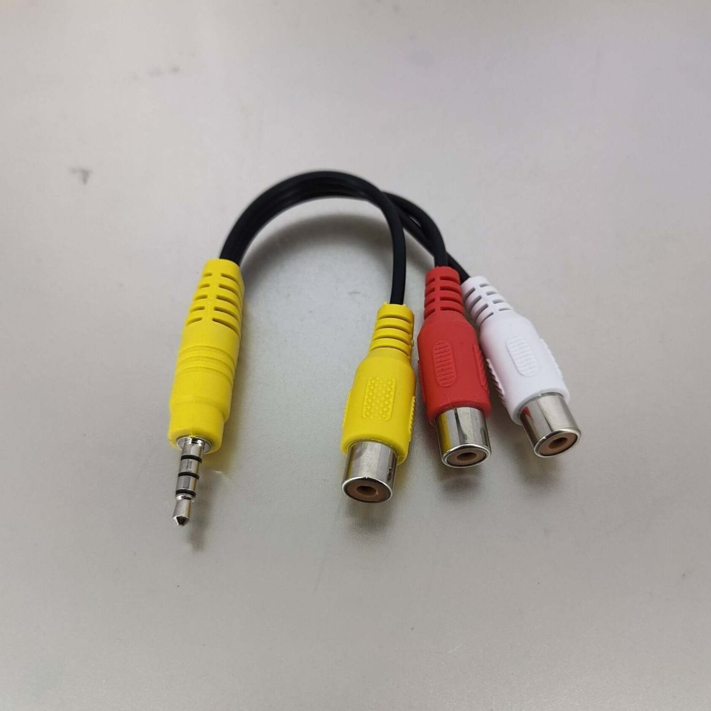 3.5mm to RCA AV adapter cable with yellow, red, and white connectors for audio/video connection.