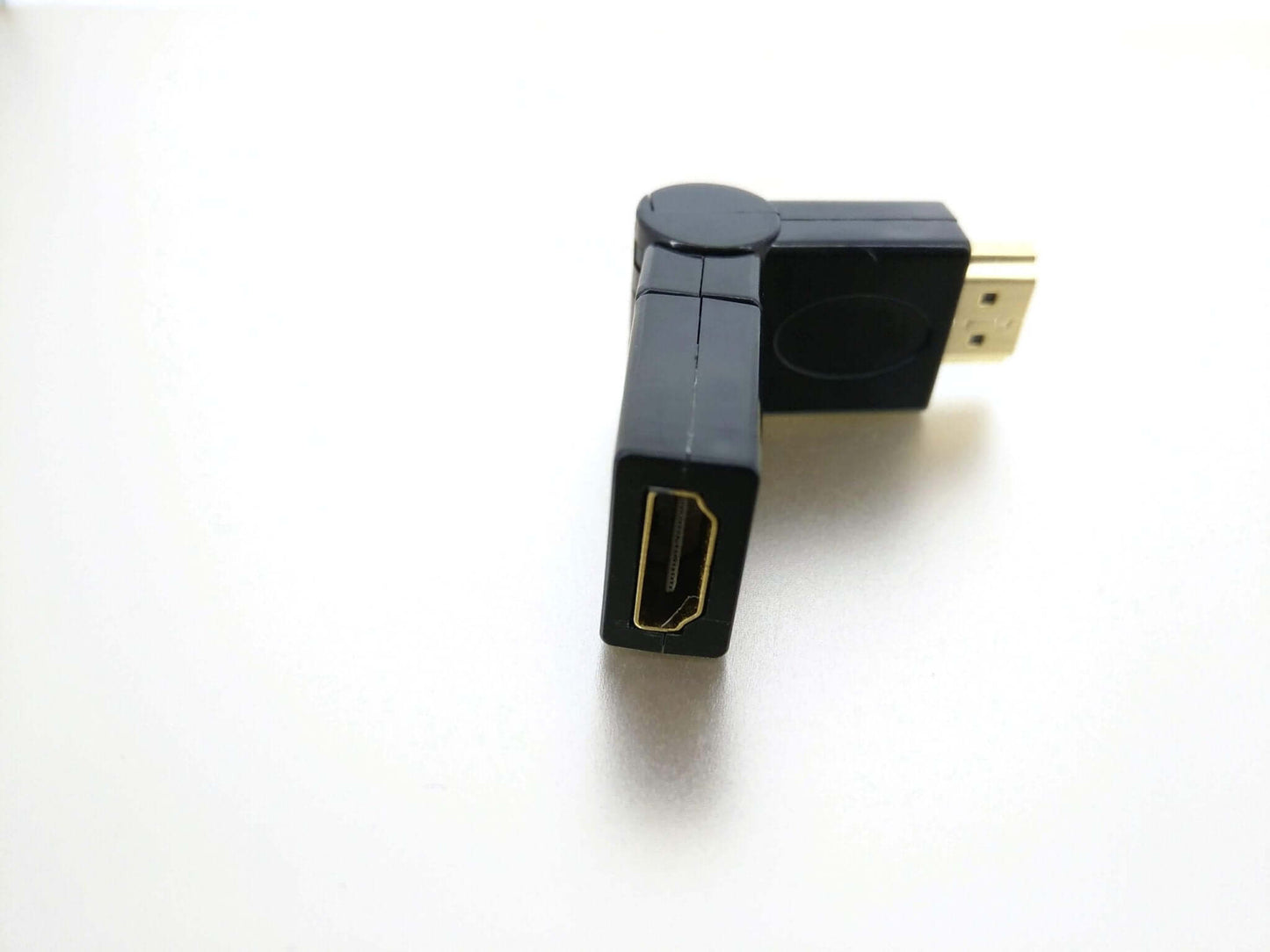 360° swivel HDMI 1.4 adapter, male to female, flexible design for optimal cable management and tight space setups.