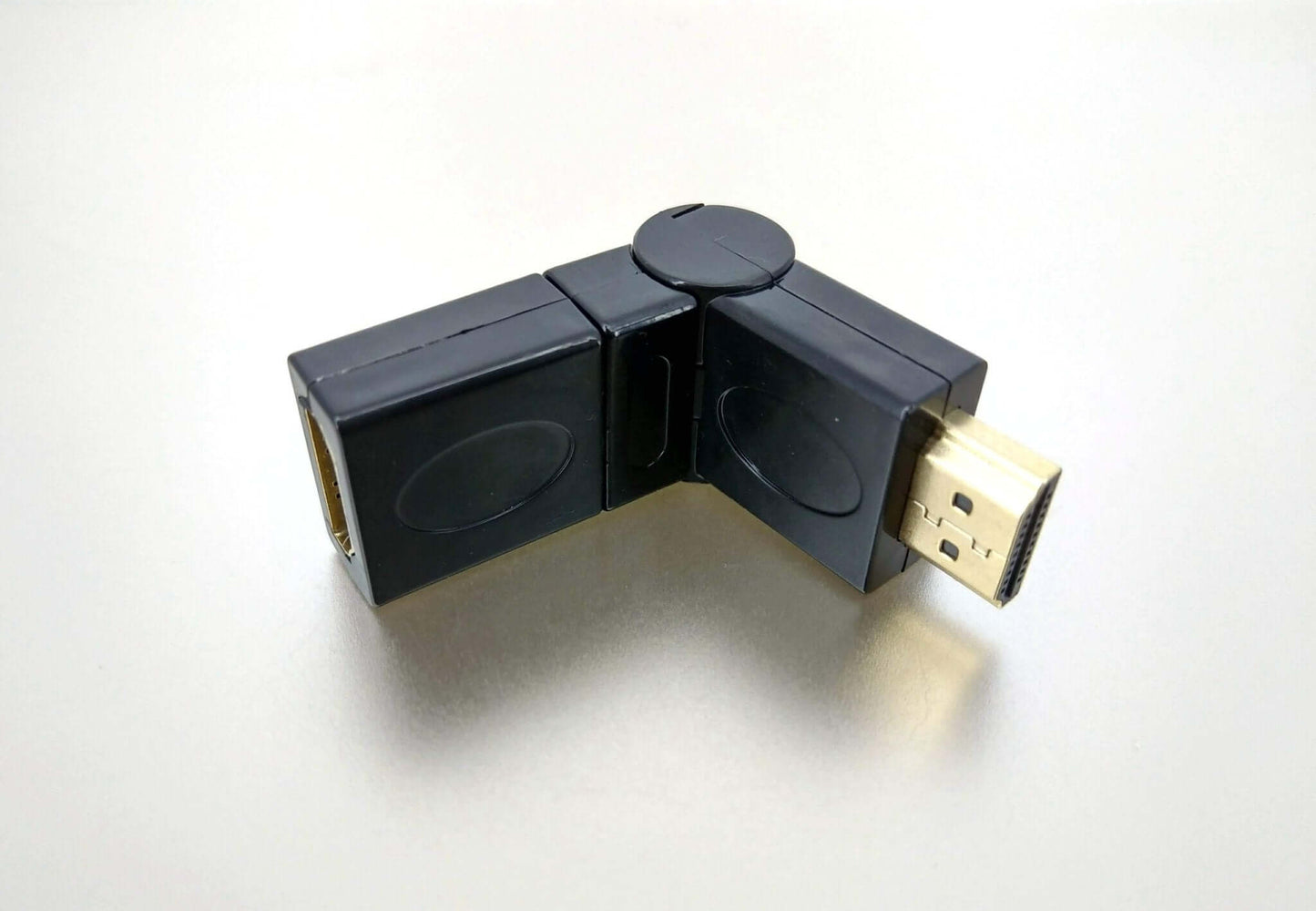 360° swivel HDMI 1.4 adapter, male to female, perfect for flexible connections and tight spaces.