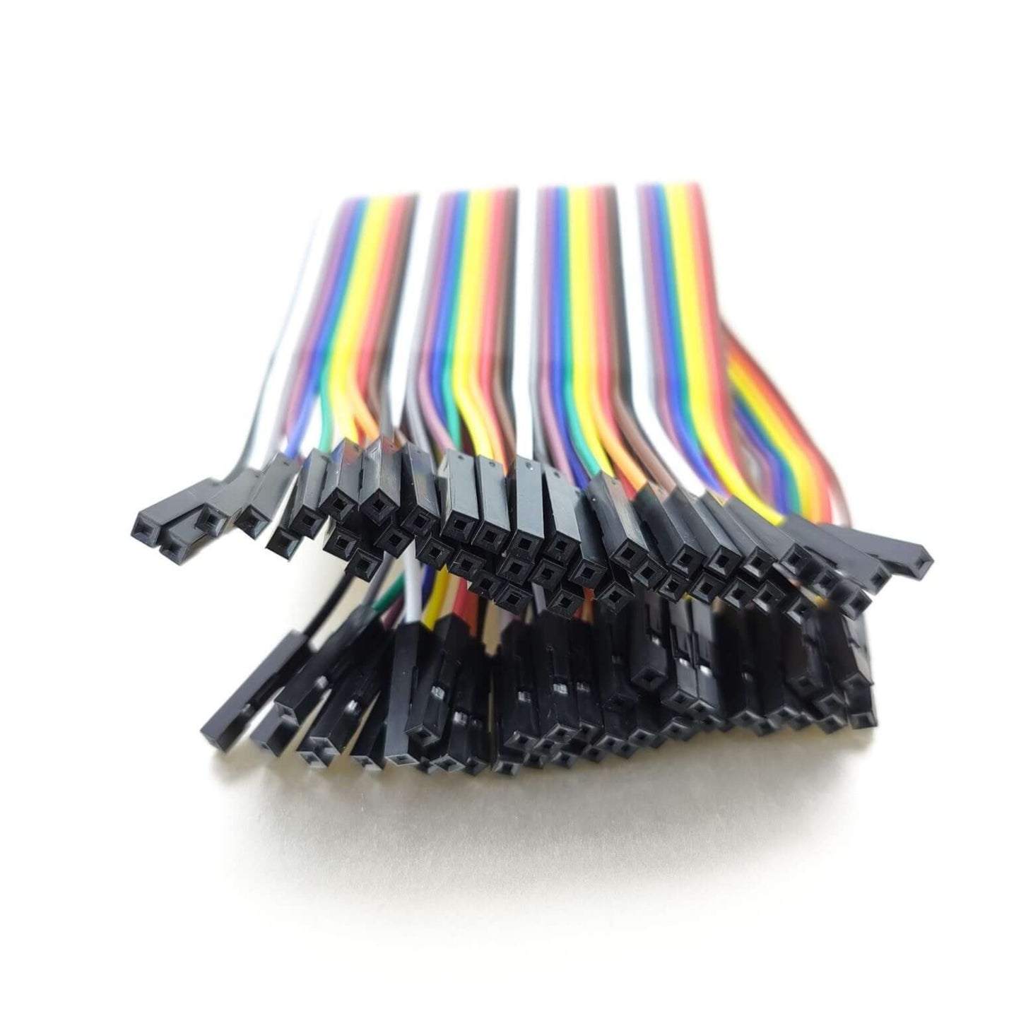 40-pin female-to-female jumper wires for breadboards, colorful ribbon cable, ideal for Arduino and DIY electronics.