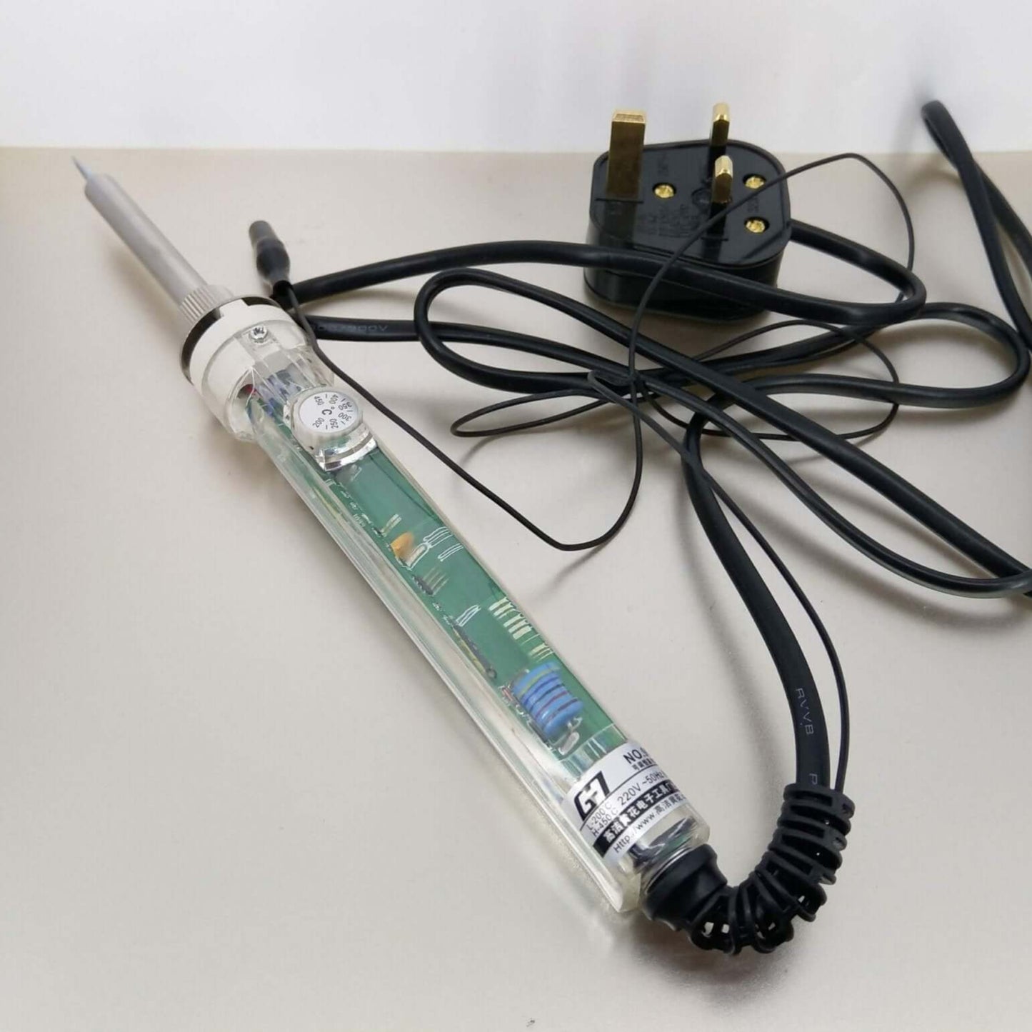 60W adjustable temperature soldering iron kit with power cord, designed for precise soldering and electronic repairs.