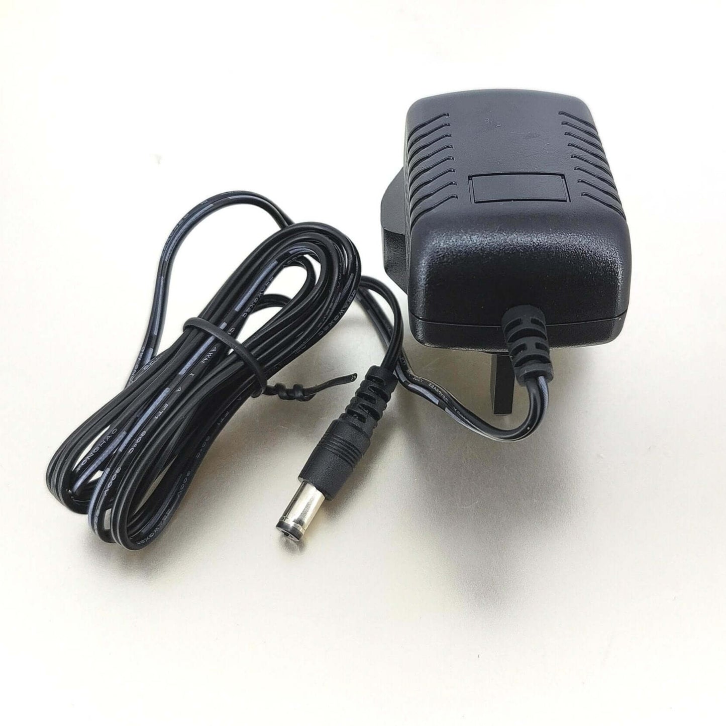 6V 2A AC adapter with a 5.5mm x 2.1mm connector and power cord, suitable for various electronic devices.