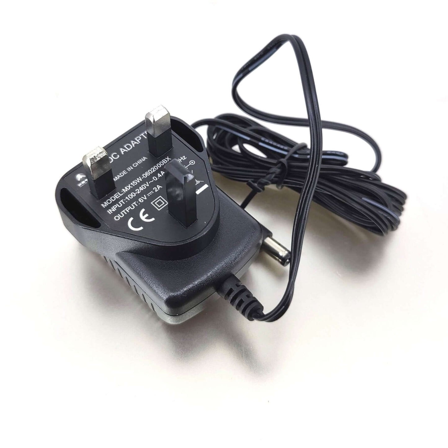 6V 2A AC adapter with 5.5mm x 2.1mm connector for power supply, model MX15W-0602000BX, compatible with 100-240V input.