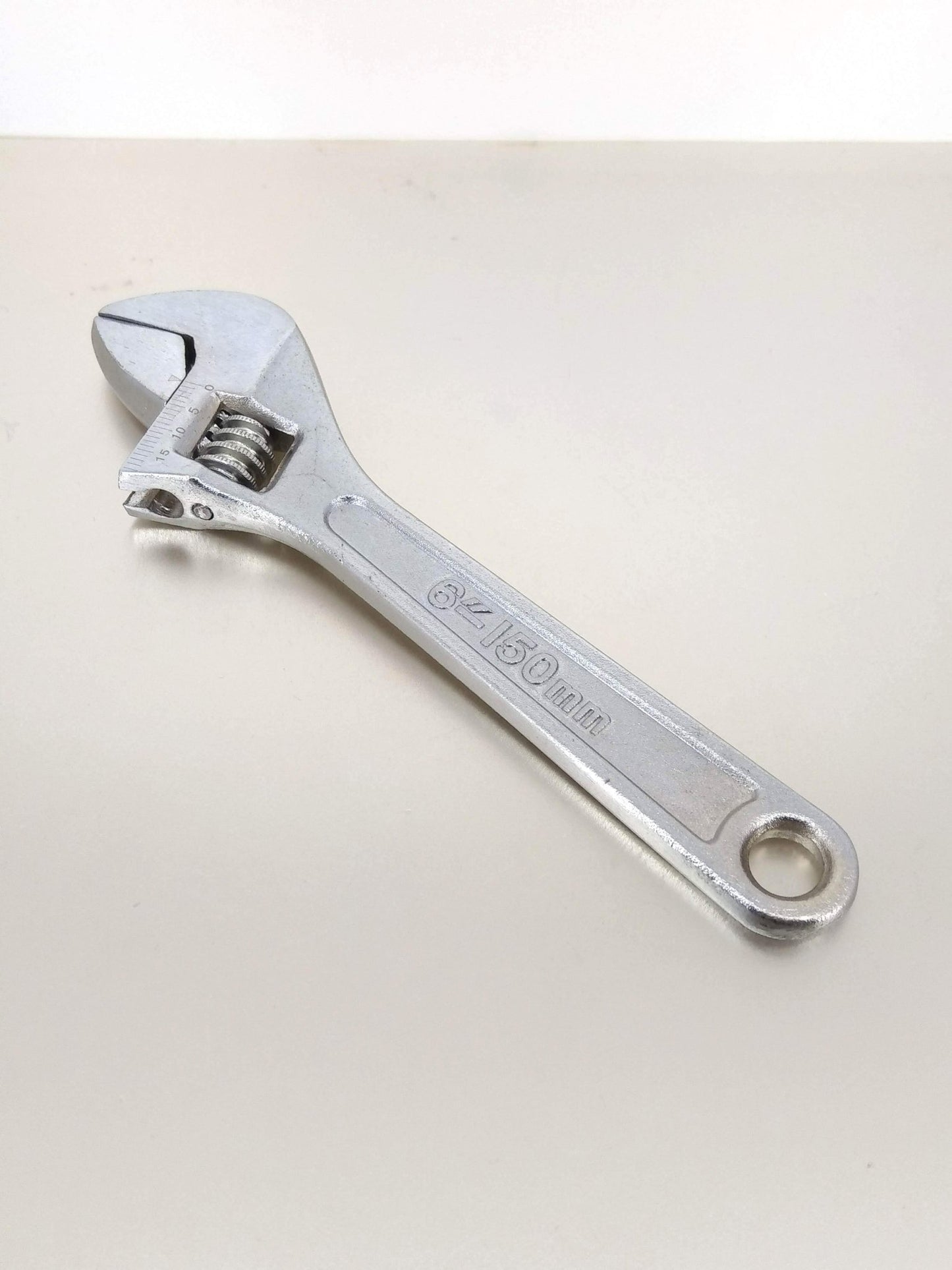 6-inch industrial grade carbon steel adjustable wrench on a light background