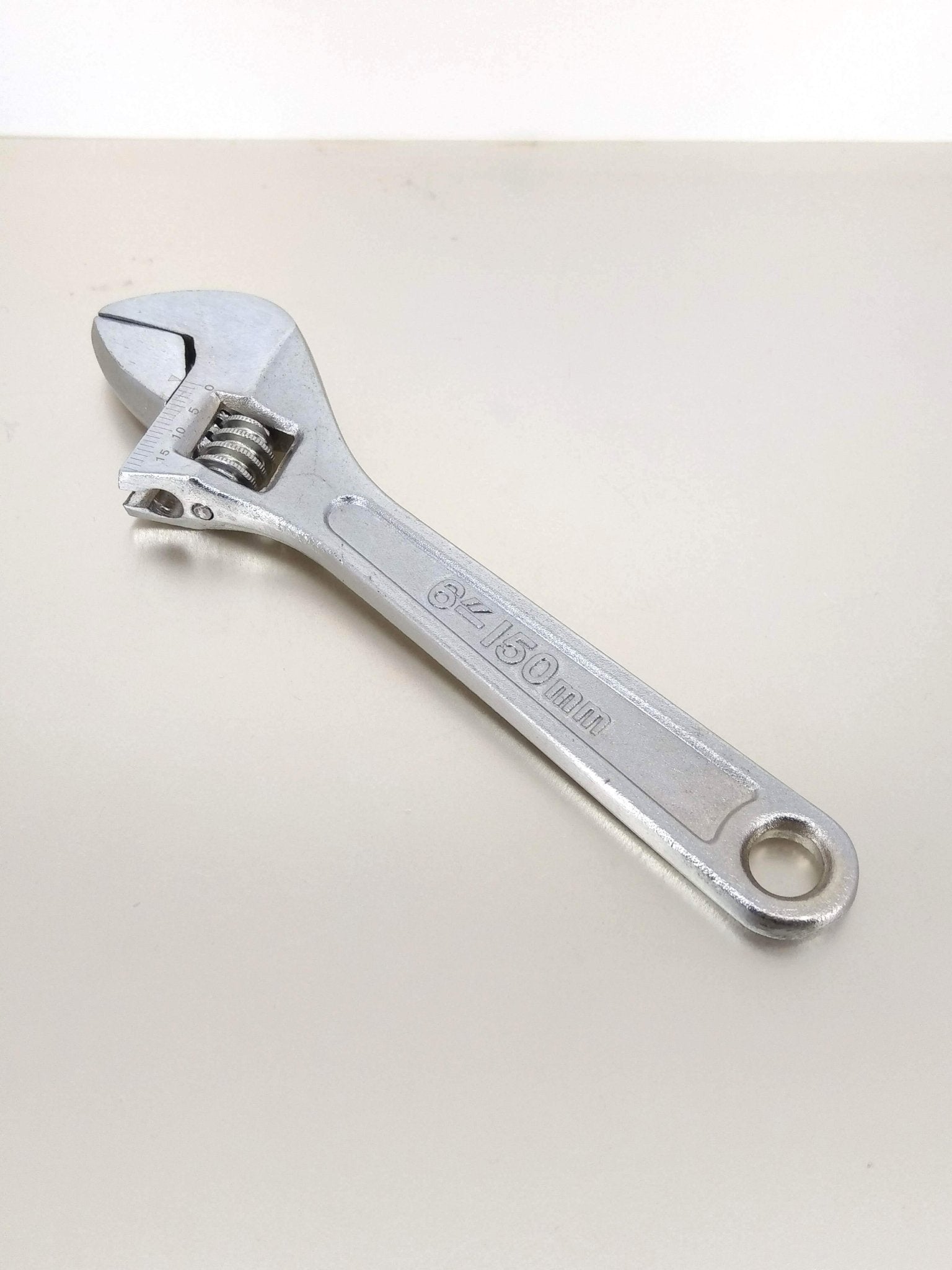6-inch industrial grade carbon steel adjustable wrench on a light background