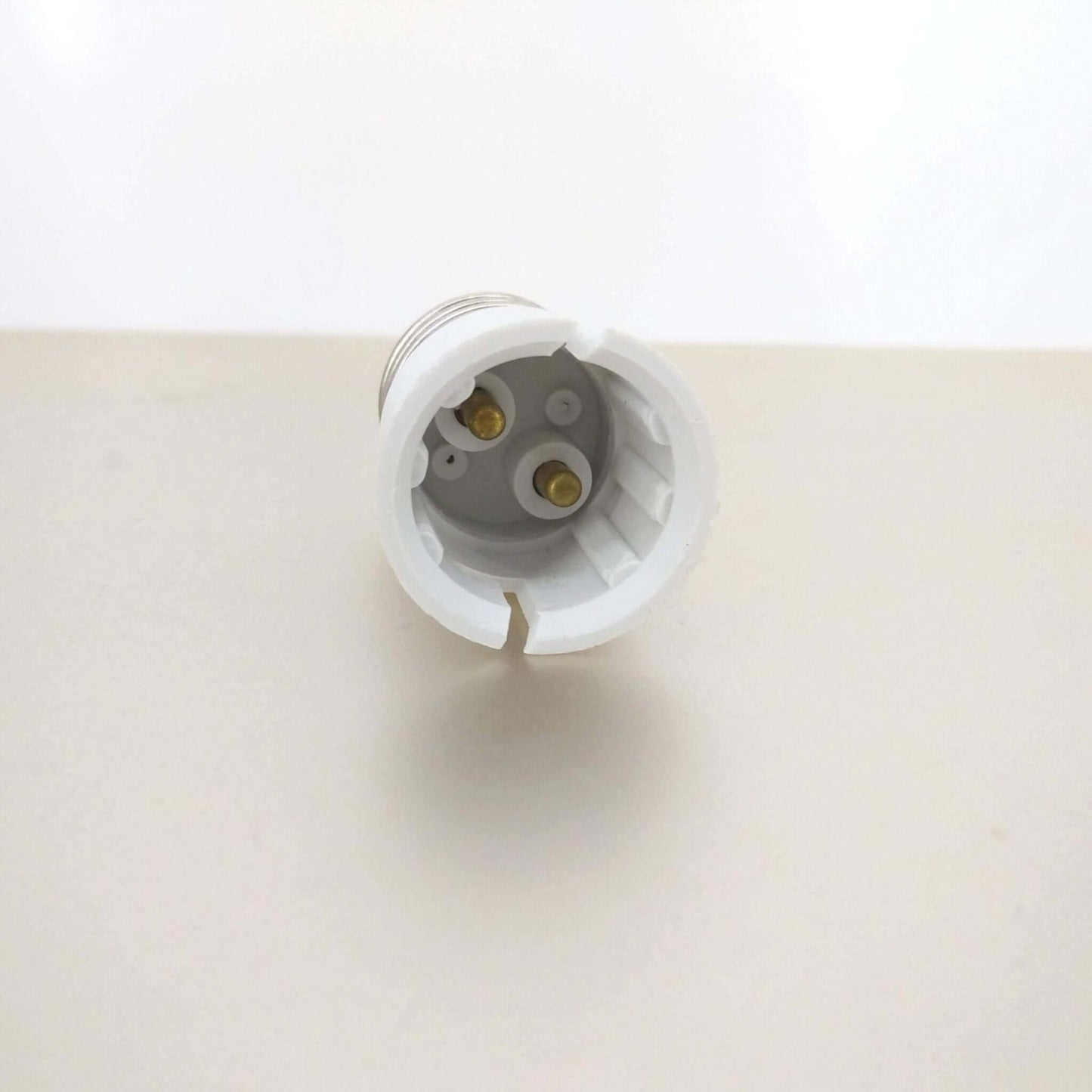 E27 Male to B22 Female Light Bulb Adapter showing connection points for easy light bulb compatibility.