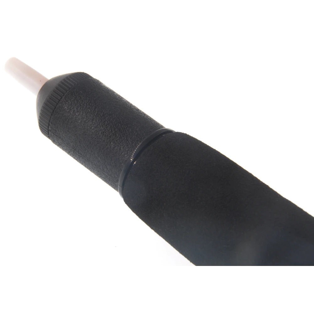 Close-up of a plastic desoldering pump, black color, designed for efficient tin suction during soldering tasks.
