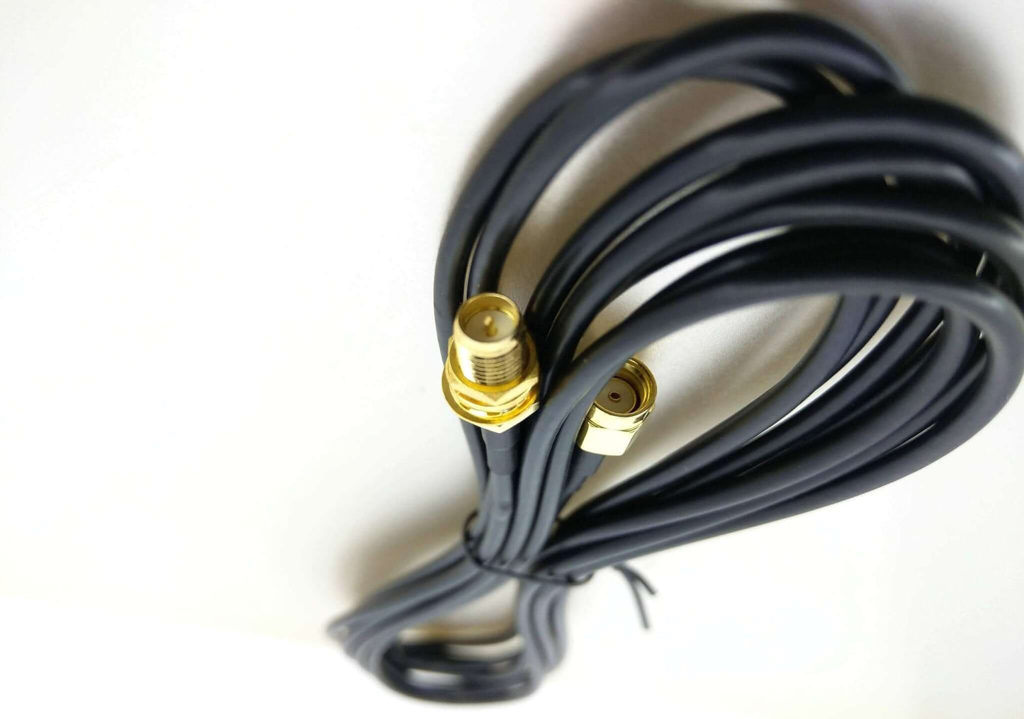 WiFi antenna extension cable 3M RP-SMA-J to RP-SMA-K with gold connectors and black RG174 cable.