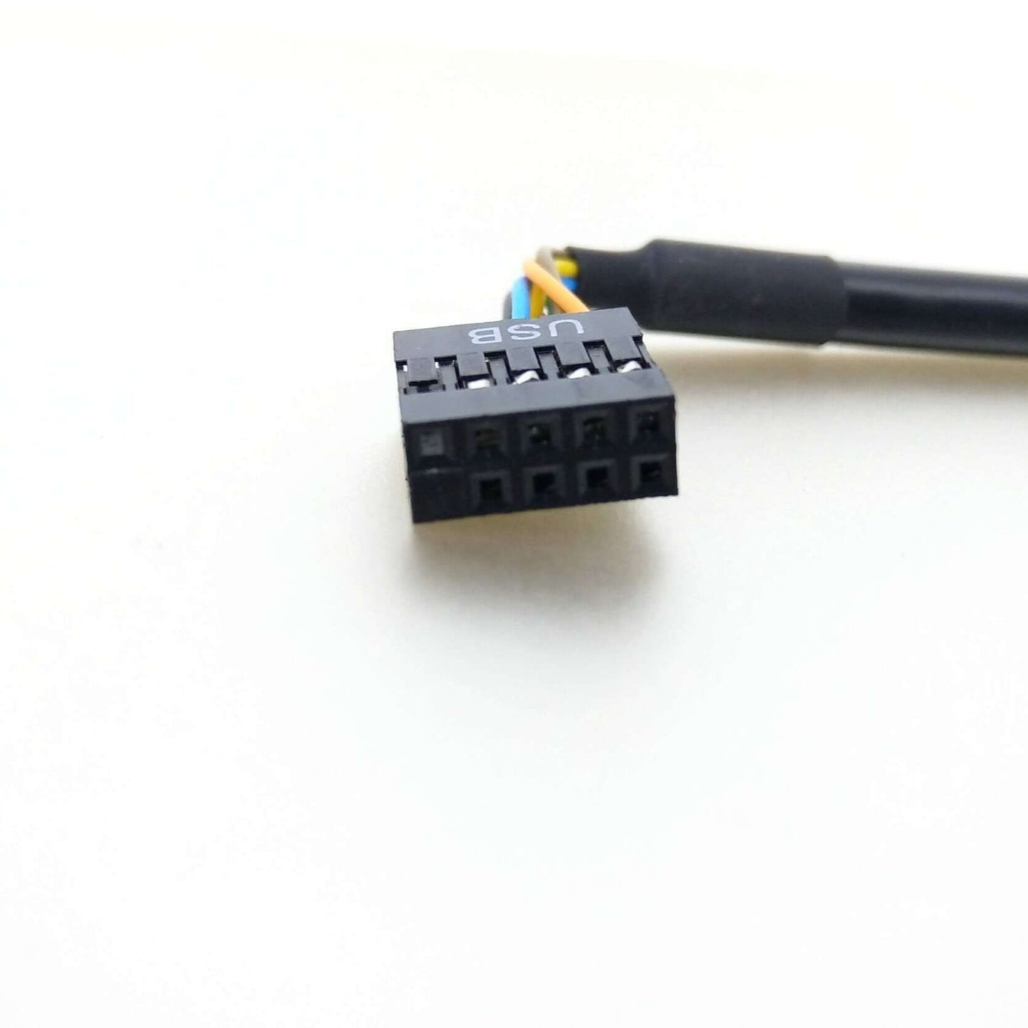 Close-up of USB 2.0 female 9-pin connector for motherboard adapter cable.