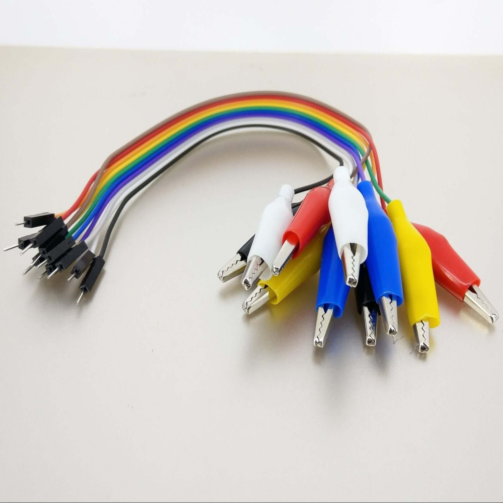 Set of 10 colorful alligator clip to male Dupont jumper wires, 20cm long, ideal for electronics projects.