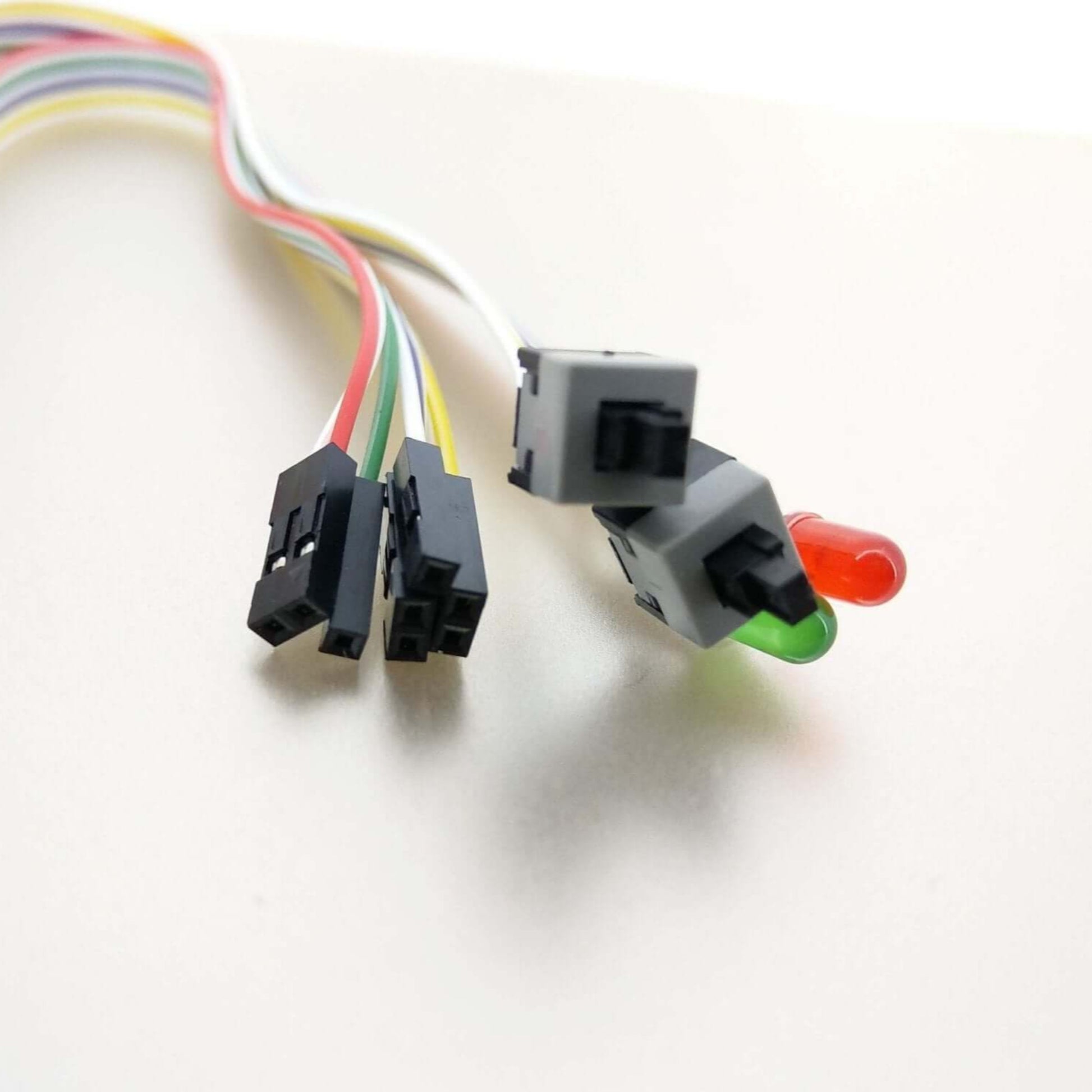 ATX PC power and reset switch cable with LED indicators, featuring multi-colored wires for computer case connectivity.