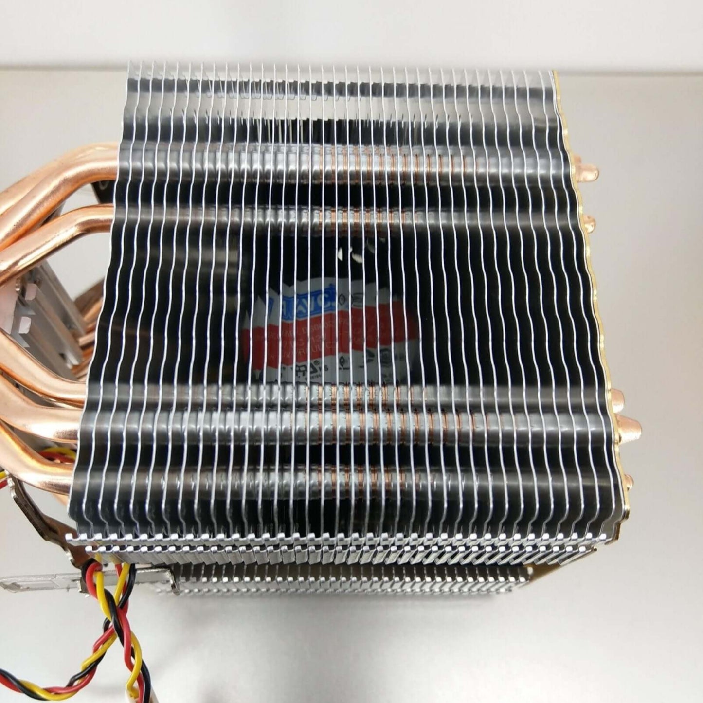 AVC 6-Heatpipe CPU Cooler showcasing copper heatpipes and aluminum fins for optimal cooling performance.