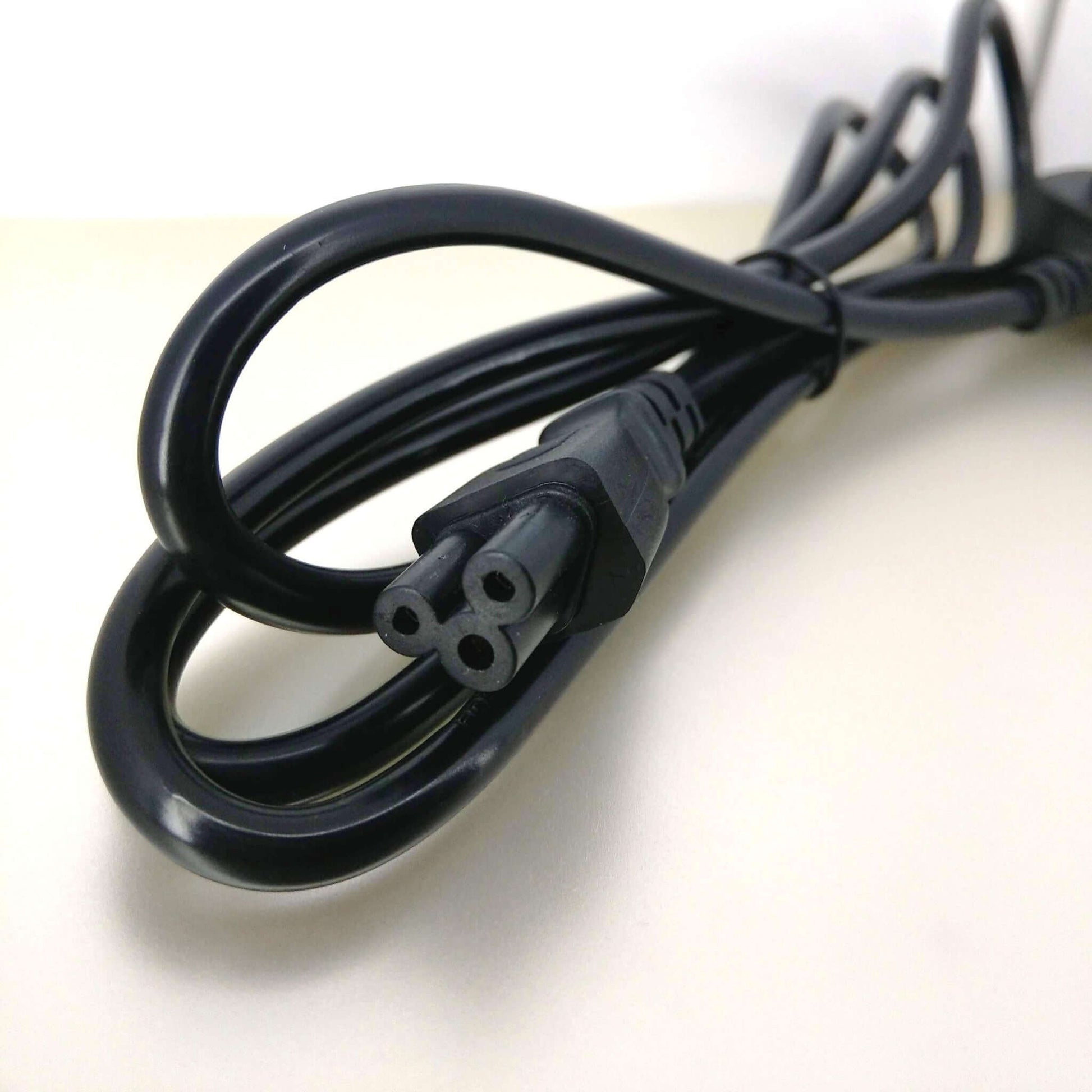 UK 3-Pin to C5 Mickey Mouse power cable showing the connector end and flexible design for easy use.