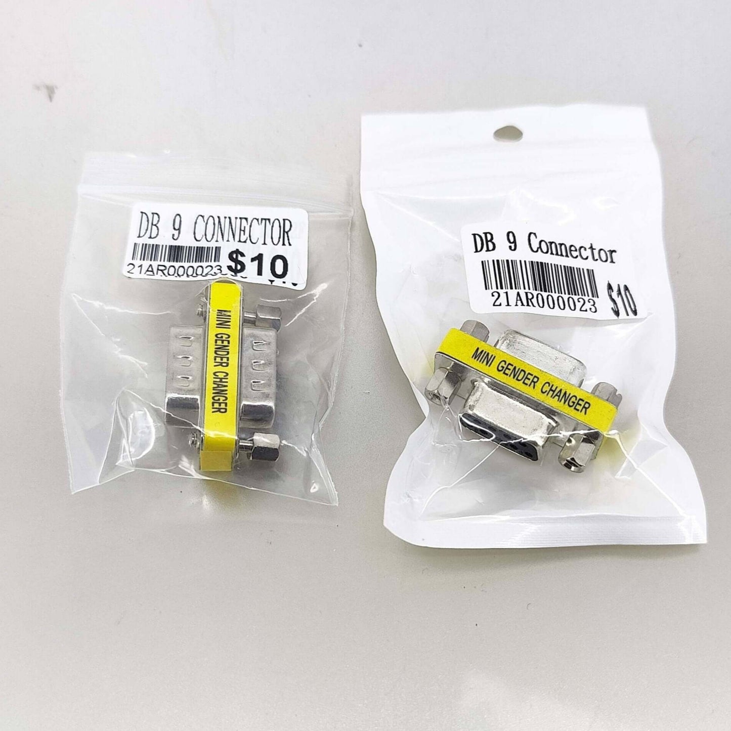 DB9 Connector F to F and M to M Gender Changer Adapters in packaging, priced at $10 each, ideal for RS232 connections.
