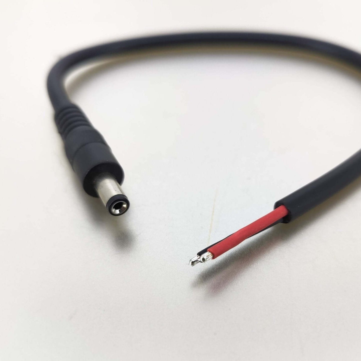 DC power pigtail cable 5.5mm x 2.1mm with bare wire open end for easy connection and repair.