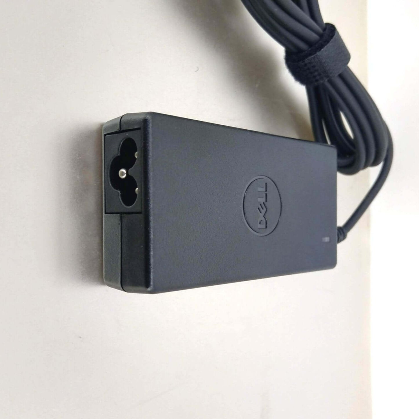 Dell 19.5V 2.31A AC power adapter. Genuine Dell charger for laptops, 45W output. Input for C5 power cord.