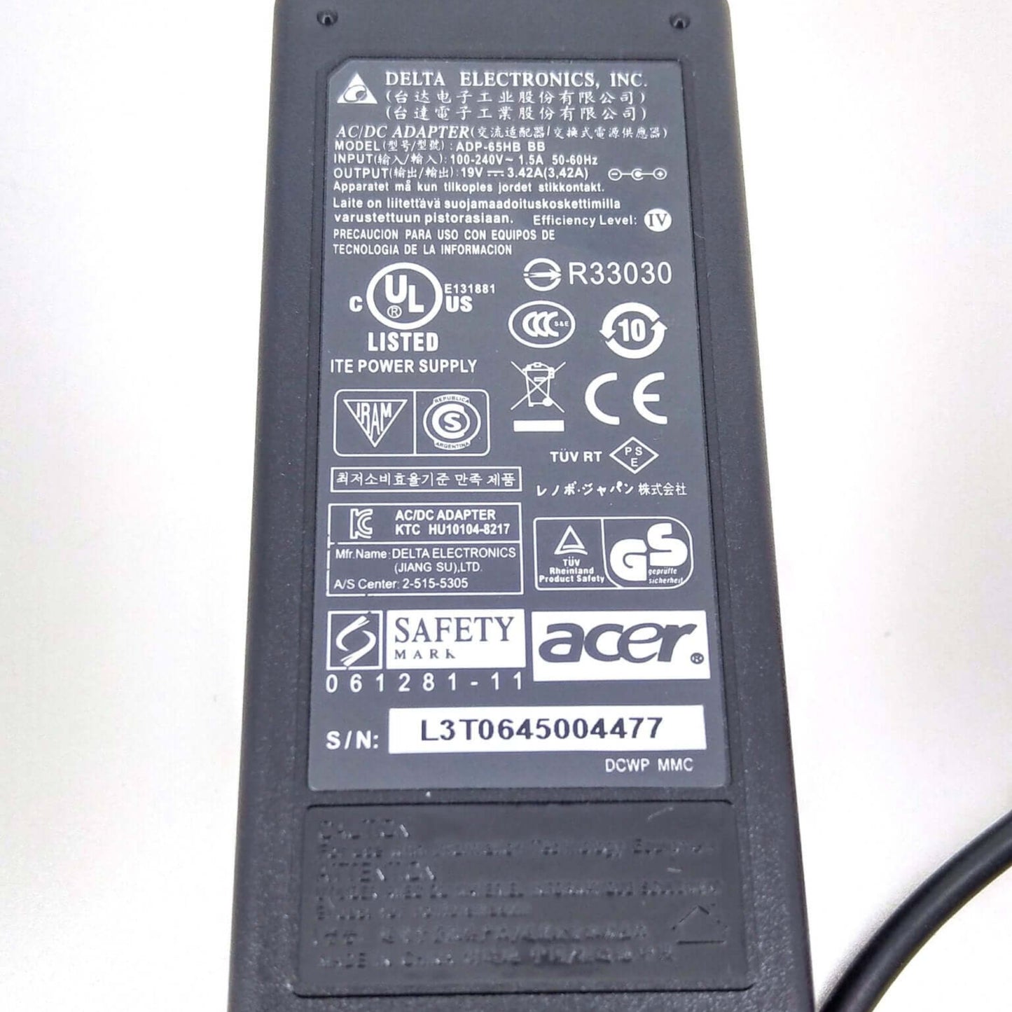 Specification label of OEM Delta Electronics ADP-65HB Adapter