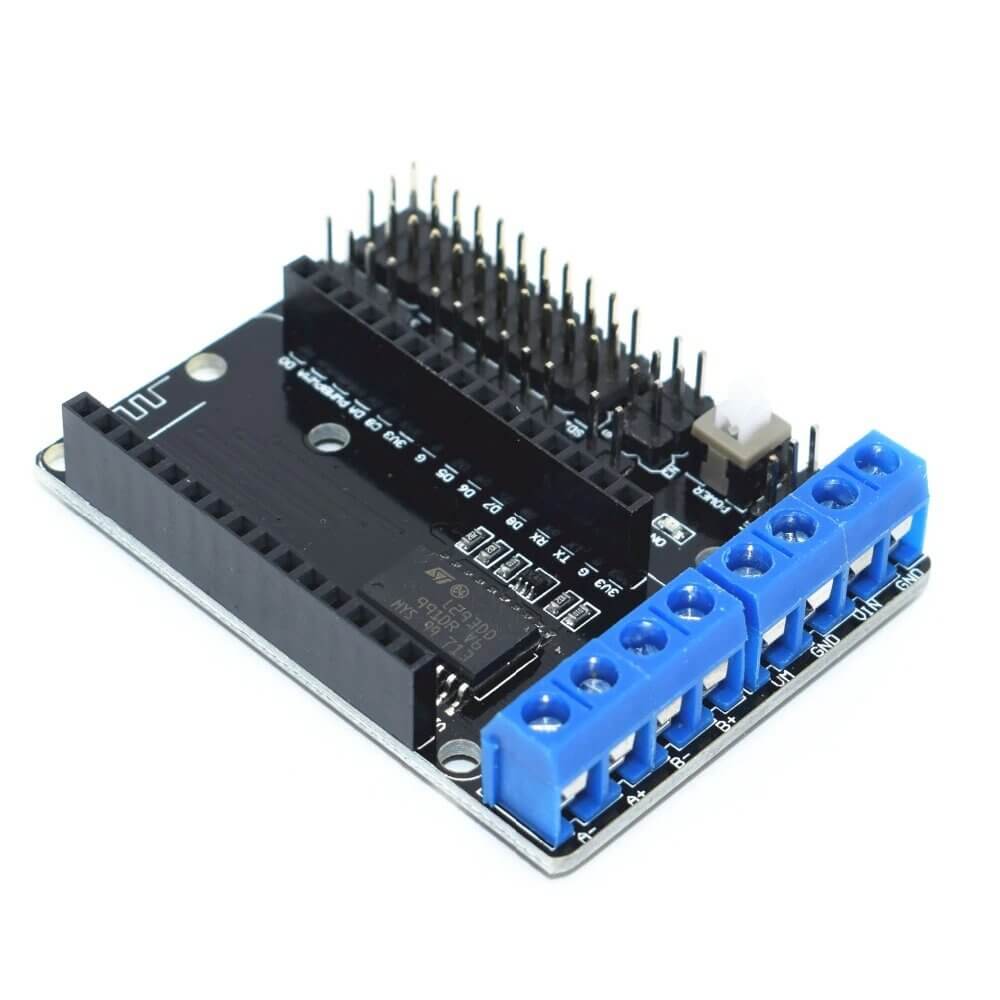 ESP-12E Motor Shield Board for NodeMCU, L293D motor drive expansion module with GPIO and power connectors.