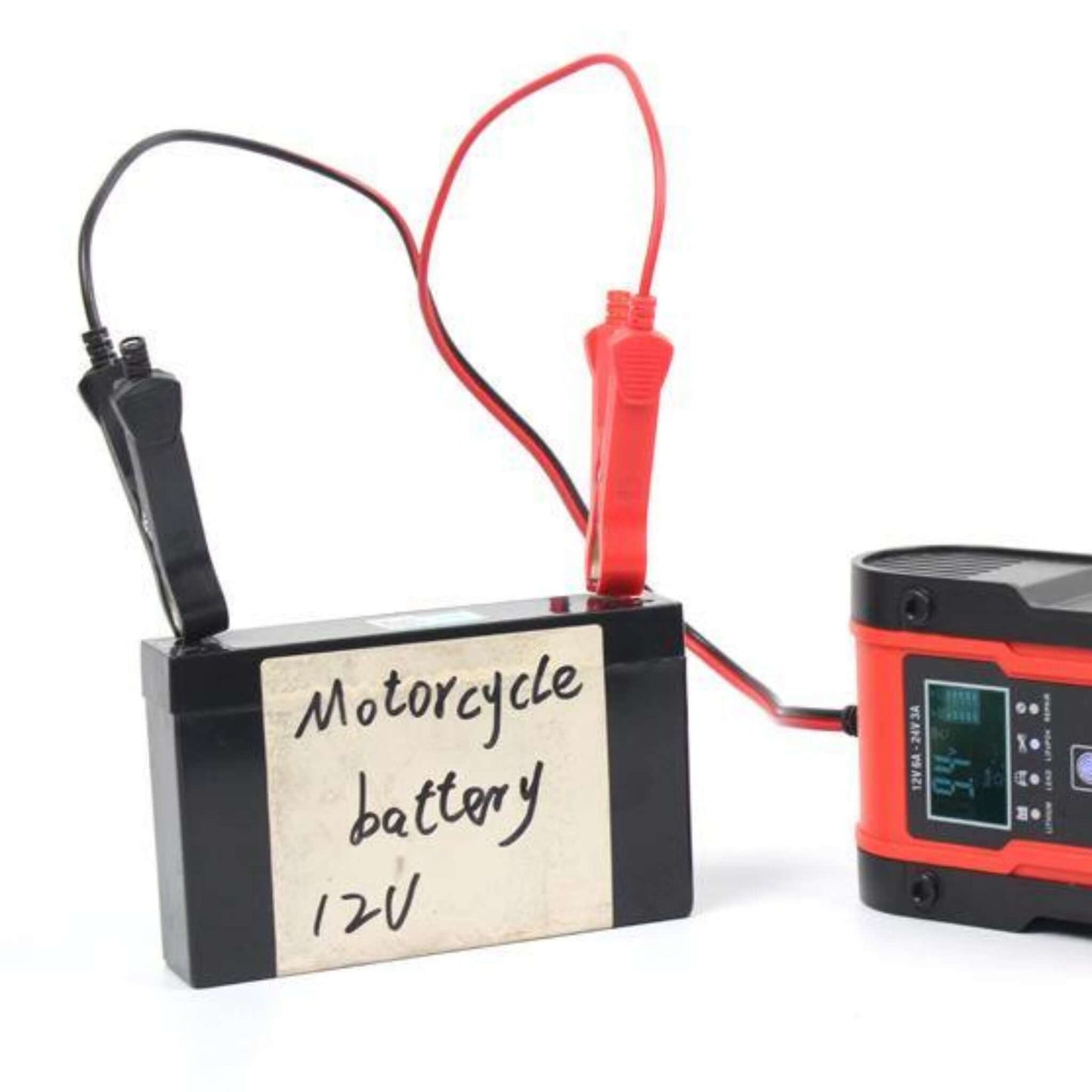 Foxsur 12V/24V Smart Battery Charger maintaining a 12V motorcycle battery, showing 9.4V. Limited