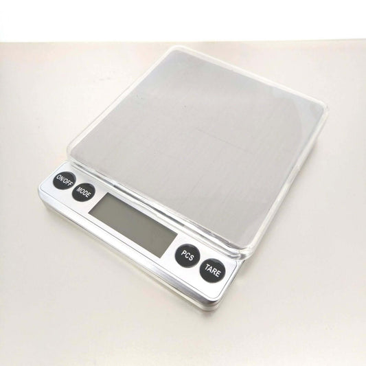 High Precision Digital Pocket Scale with clear display and tare function, measuring up to 3000g with 0.1g accuracy.