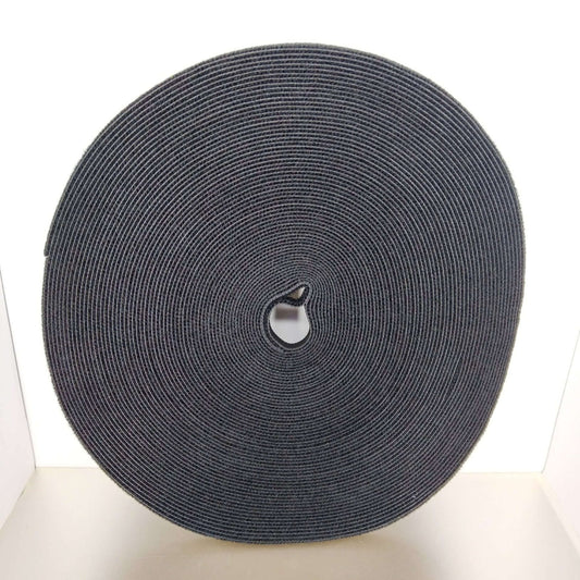 1cm x 25m self-adhesive hook and loop fastener cable ties in a circular roll, ideal for organizing cables and wires.