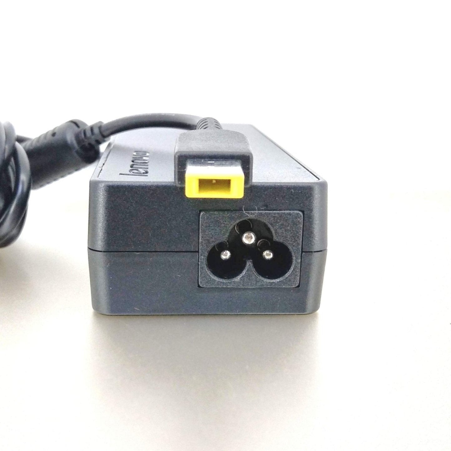 Lenovo 90W AC adapter showing the C5 "Mickey Mouse" power input and yellow rectangular laptop connector tip.