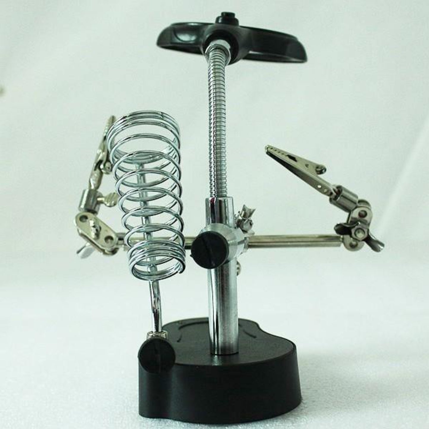 3.5X 12X magnifying glass tool with soldering iron stand and clips, ideal for jewelry and electronics work.
