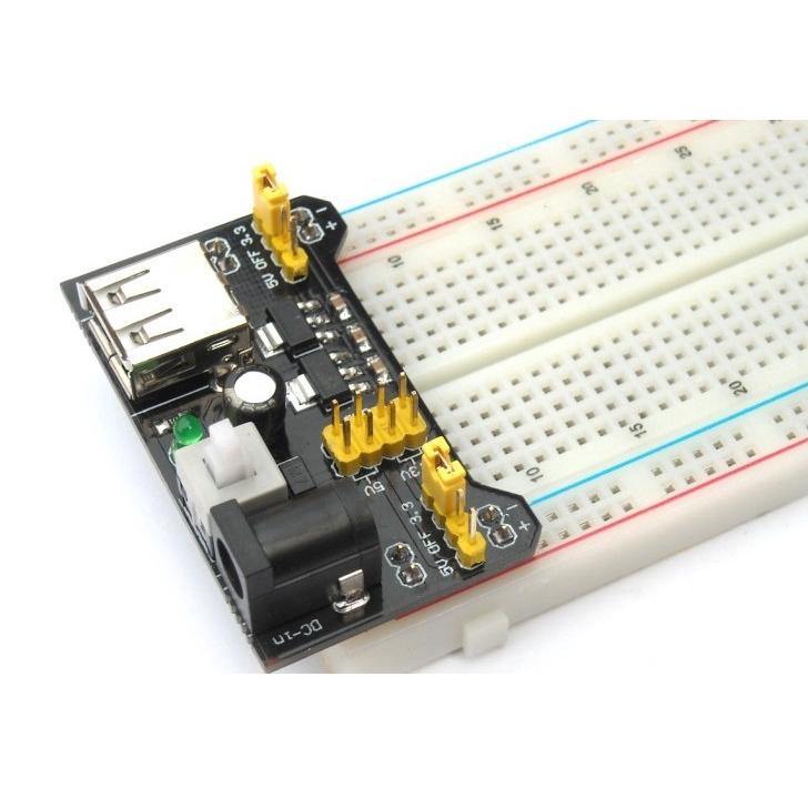 MB-102 Breadboard Power Supply Module with USB and DC input ports for 3.3V/5V power output.