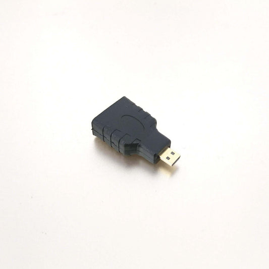 Micro HDMI to HDMI adapter, compact design with USB connector, supports HD video connection.