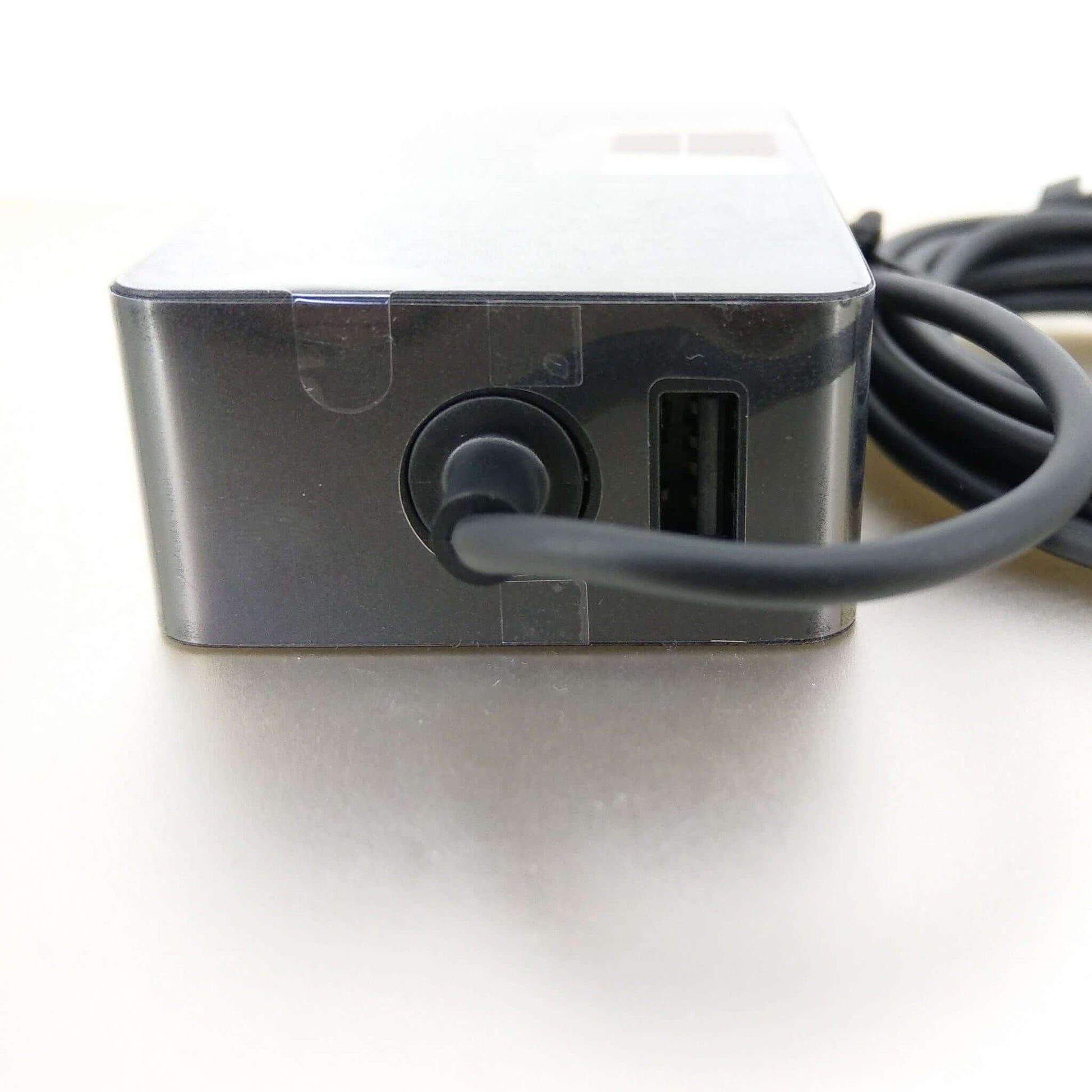 Microsoft Surface 65W Power Adapter Charger Model 1706 with USB port and power connection cable.
