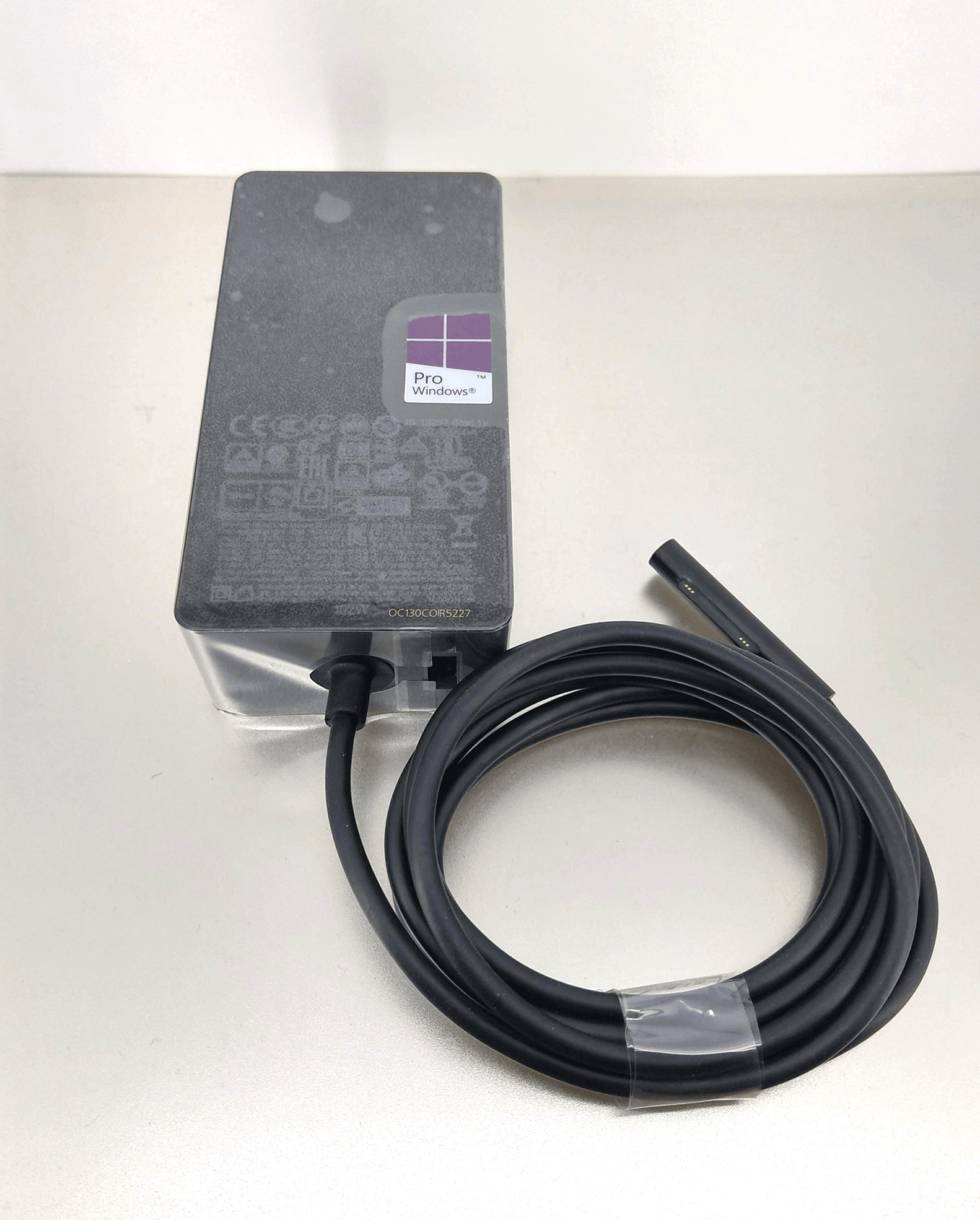 102W Microsoft Surface Charger with power cable, designed for optimal performance with Surface devices.