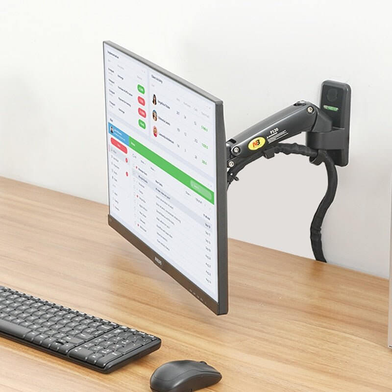 NB F120 full motion wall mount supporting a 17-27 inch monitor, enhancing ergonomic workspace and viewing comfort.