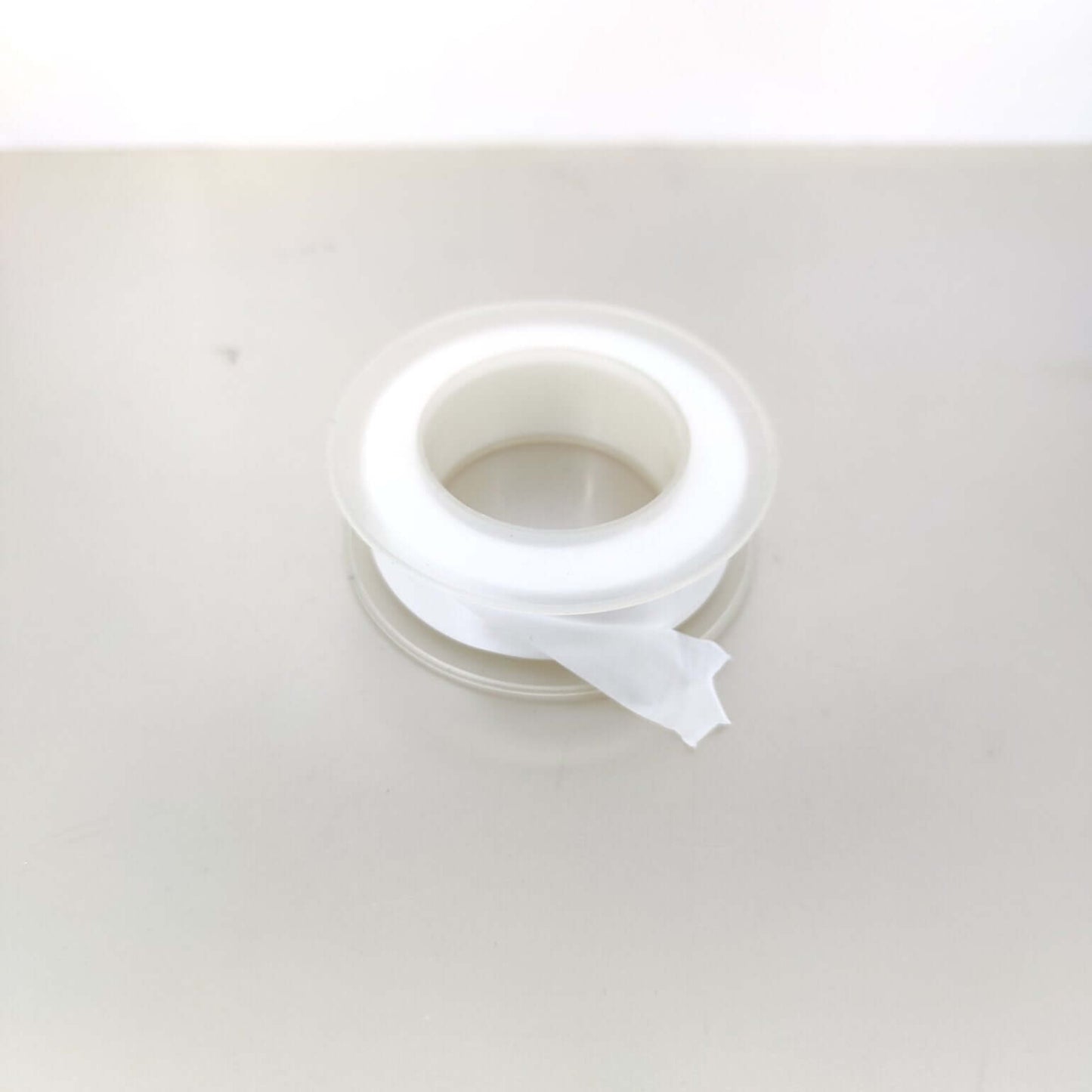 Premium PTFE thread seal tape roll for plumbing and gas applications, ensuring watertight and gas-tight seals.