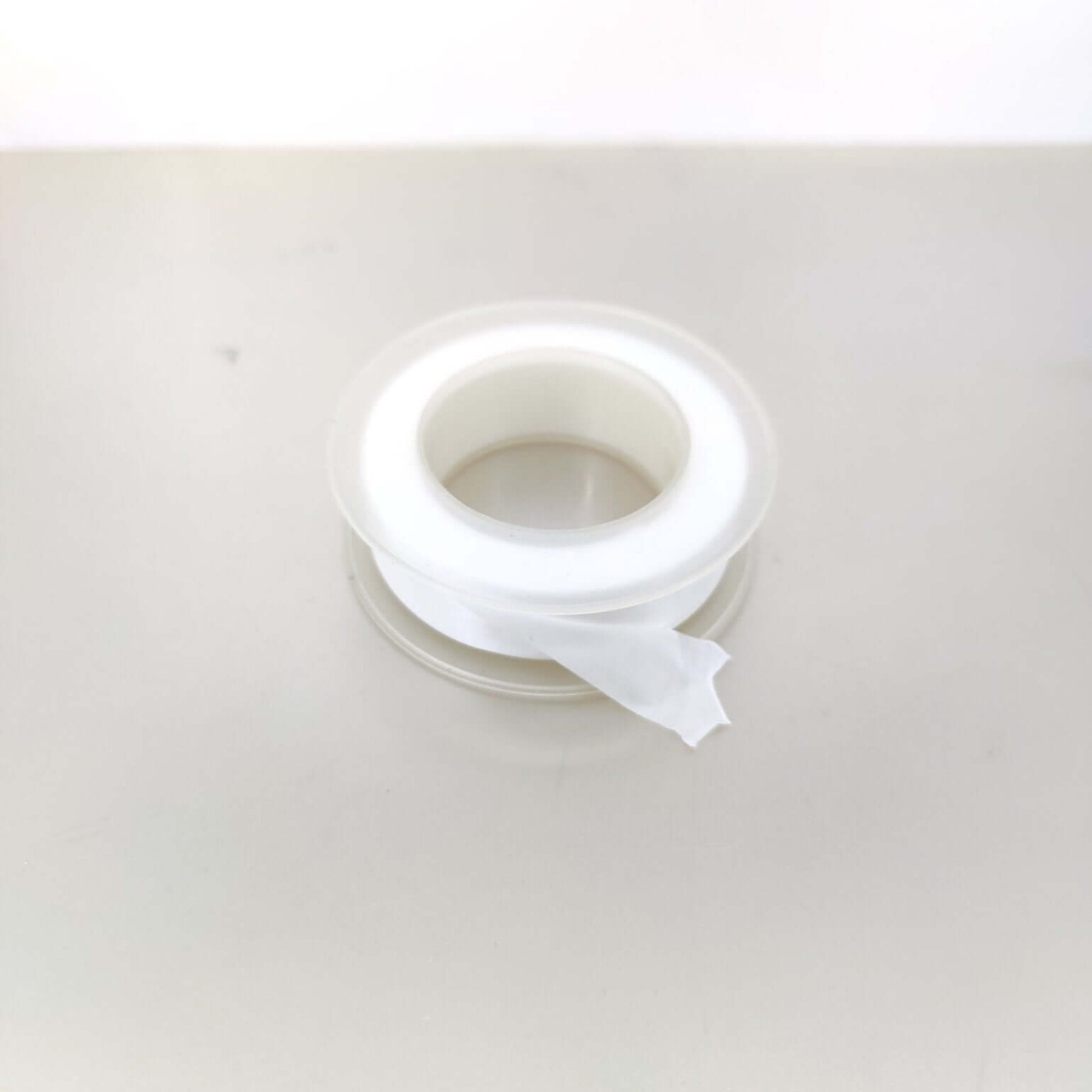 Premium PTFE thread seal tape roll for plumbing and gas applications, ensuring watertight and gas-tight seals.