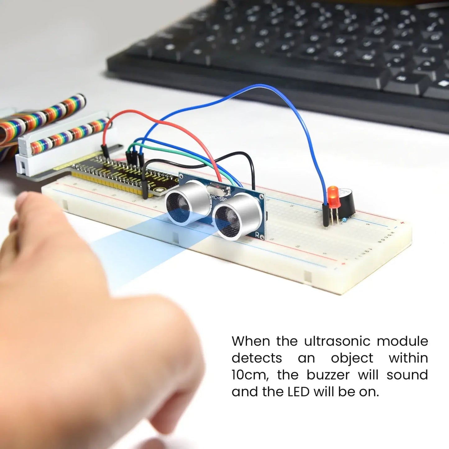An ultrasonic distance sensor project with an LED and buzzer, built using the Keyestudio Raspberry Pi kit.