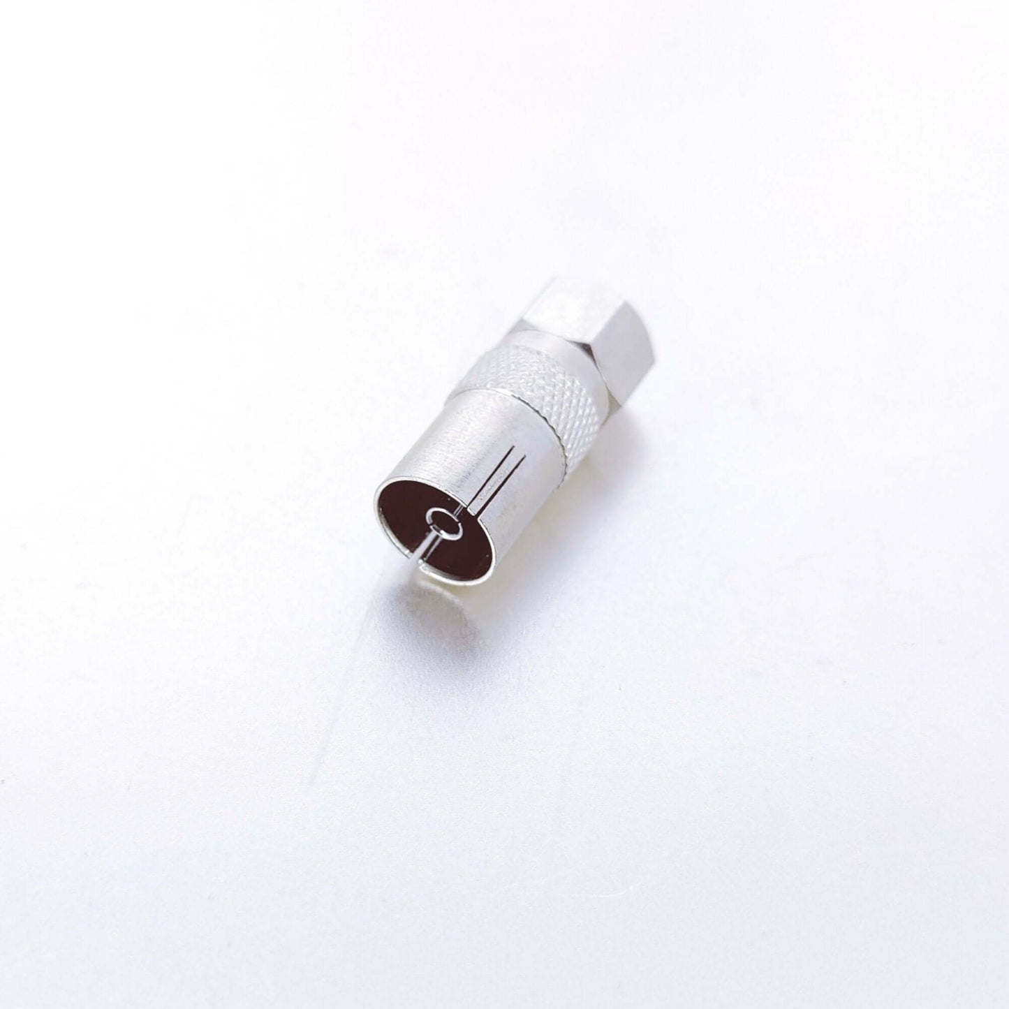 RF Female to F-Type Male coax adapter for seamless connection of coaxial cables.