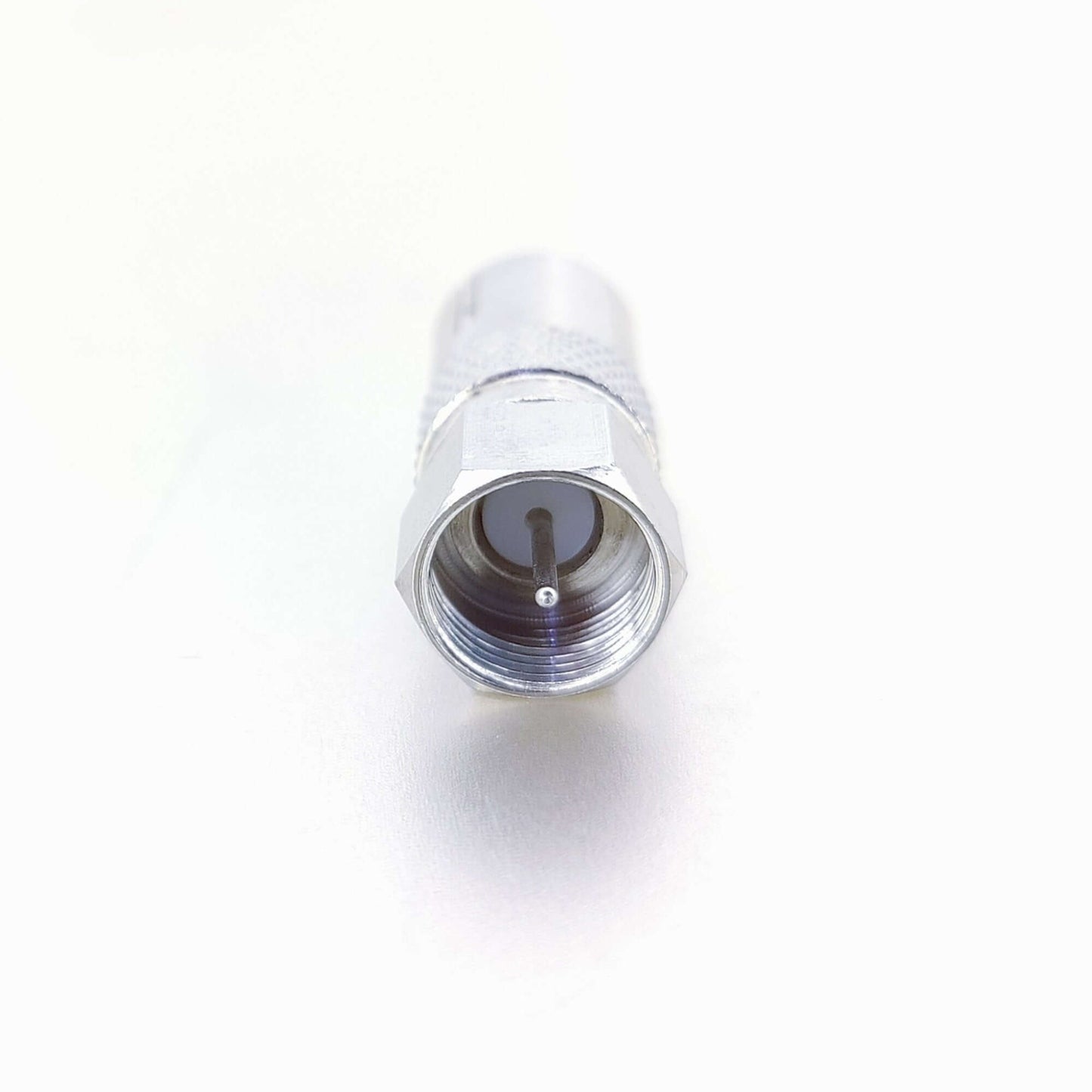 Close-up of RF Female to F-Type Male coax adapter, perfect for satellite and DVR connections.