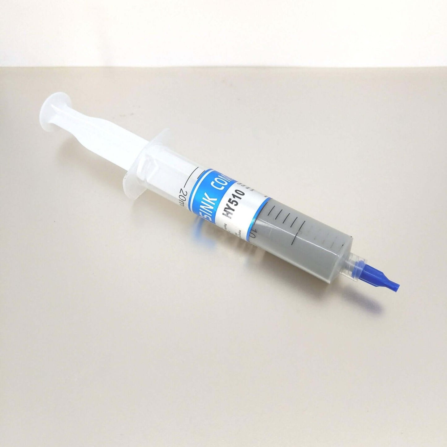 HY510 high-performance thermal paste syringe for PC cooling, 30g, designed for optimal heat transfer.