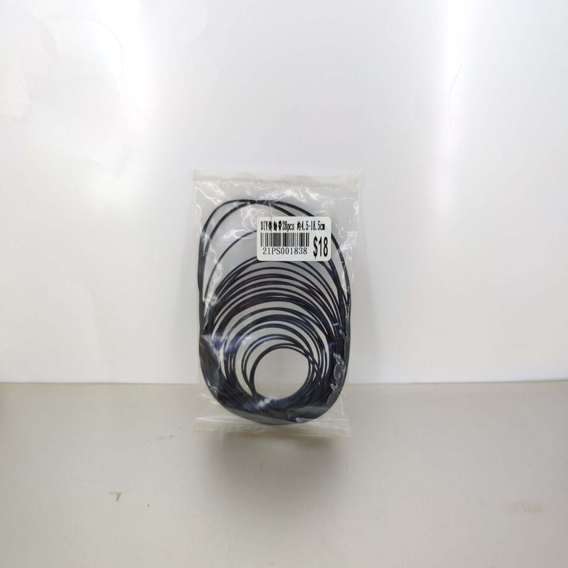 Universal 1mm square rubber drive belt mix packaged in clear bag with label, suitable for electronics repair.
